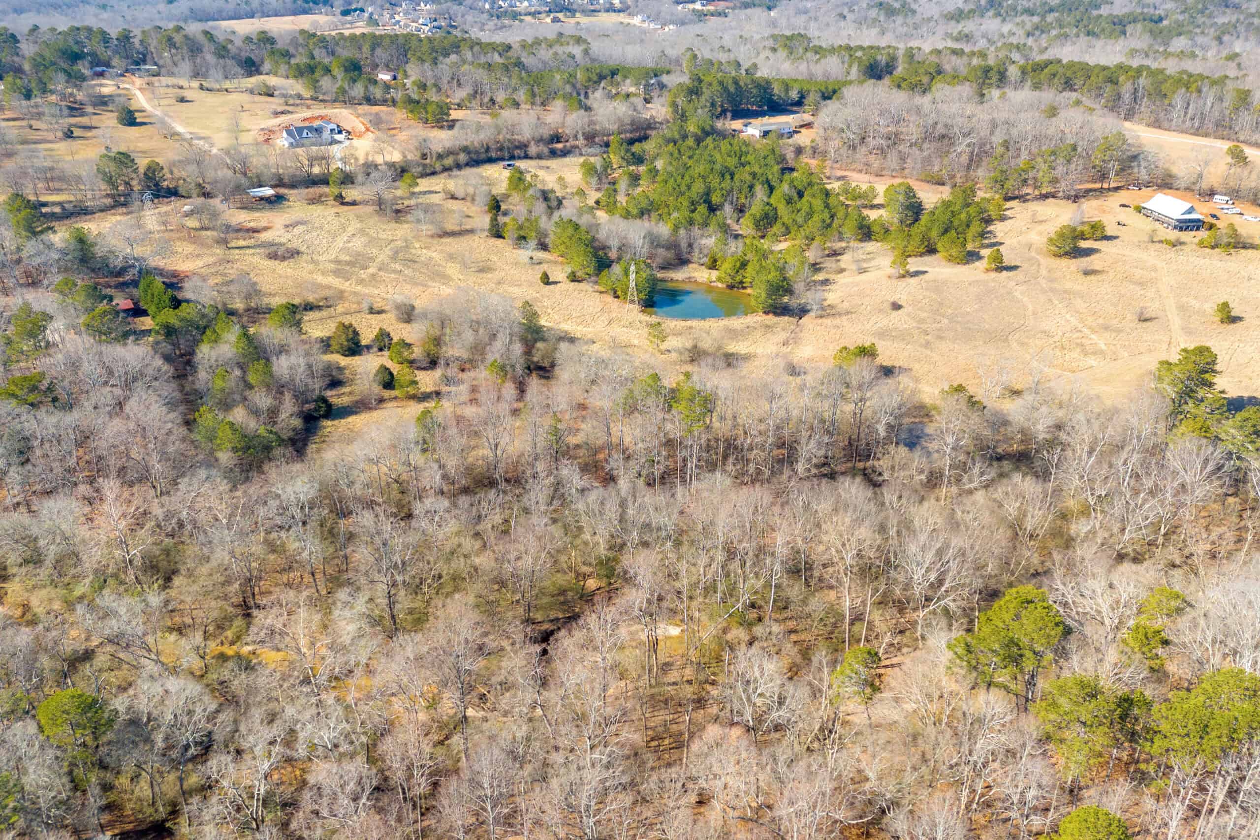 49+/- Acres of Beautiful Pasture with Two Ponds, Barn, and Creek Frontage.