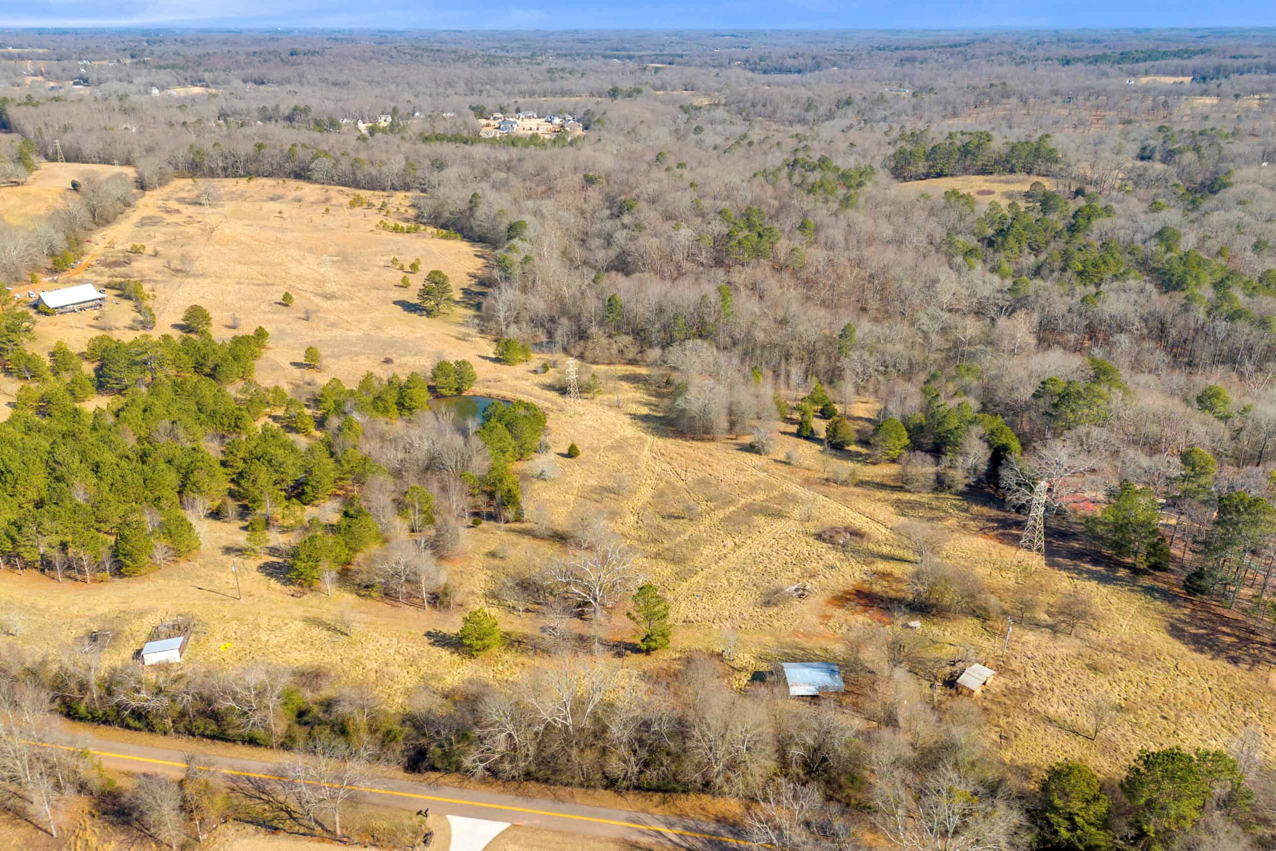 49+/- Acres of Beautiful Pasture with Two Ponds, Barn, and Creek Frontage.