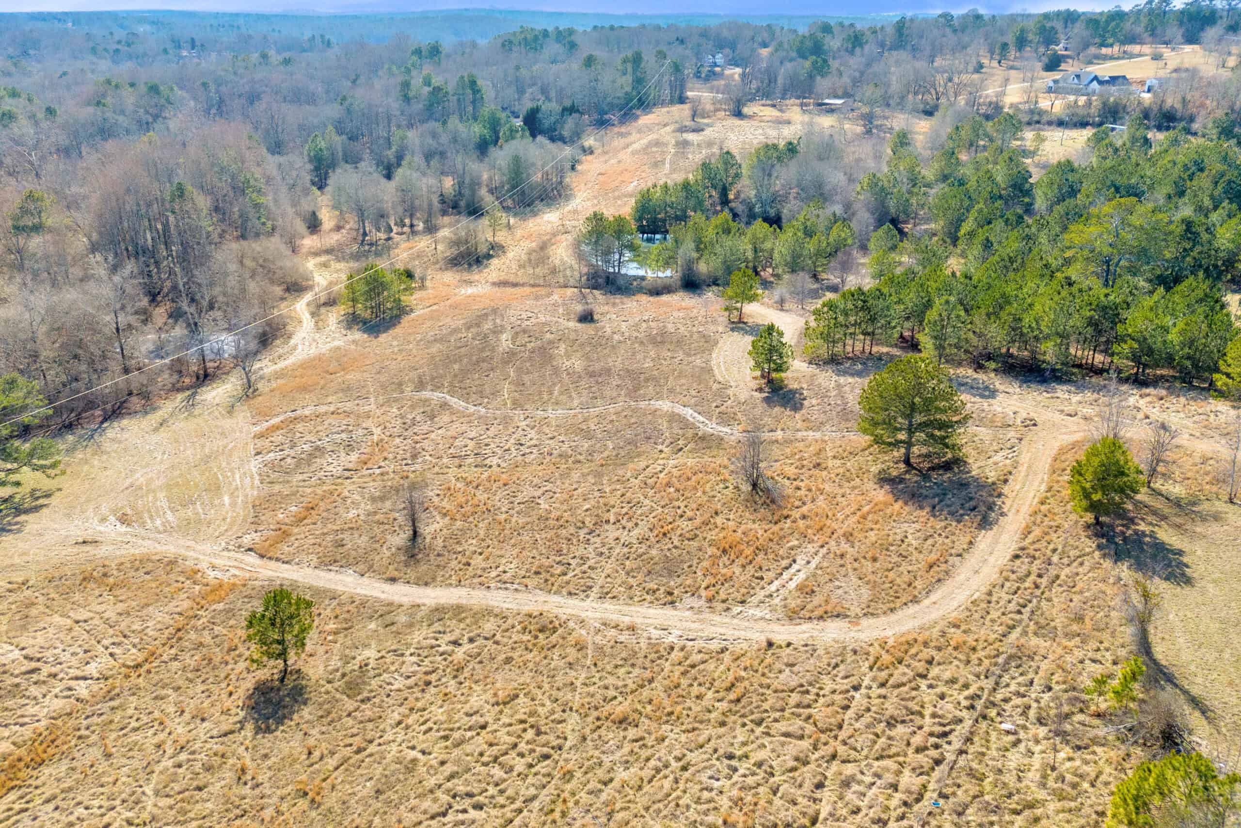 49+/- Acres of Beautiful Pasture with Two Ponds, Barn, and Creek Frontage.