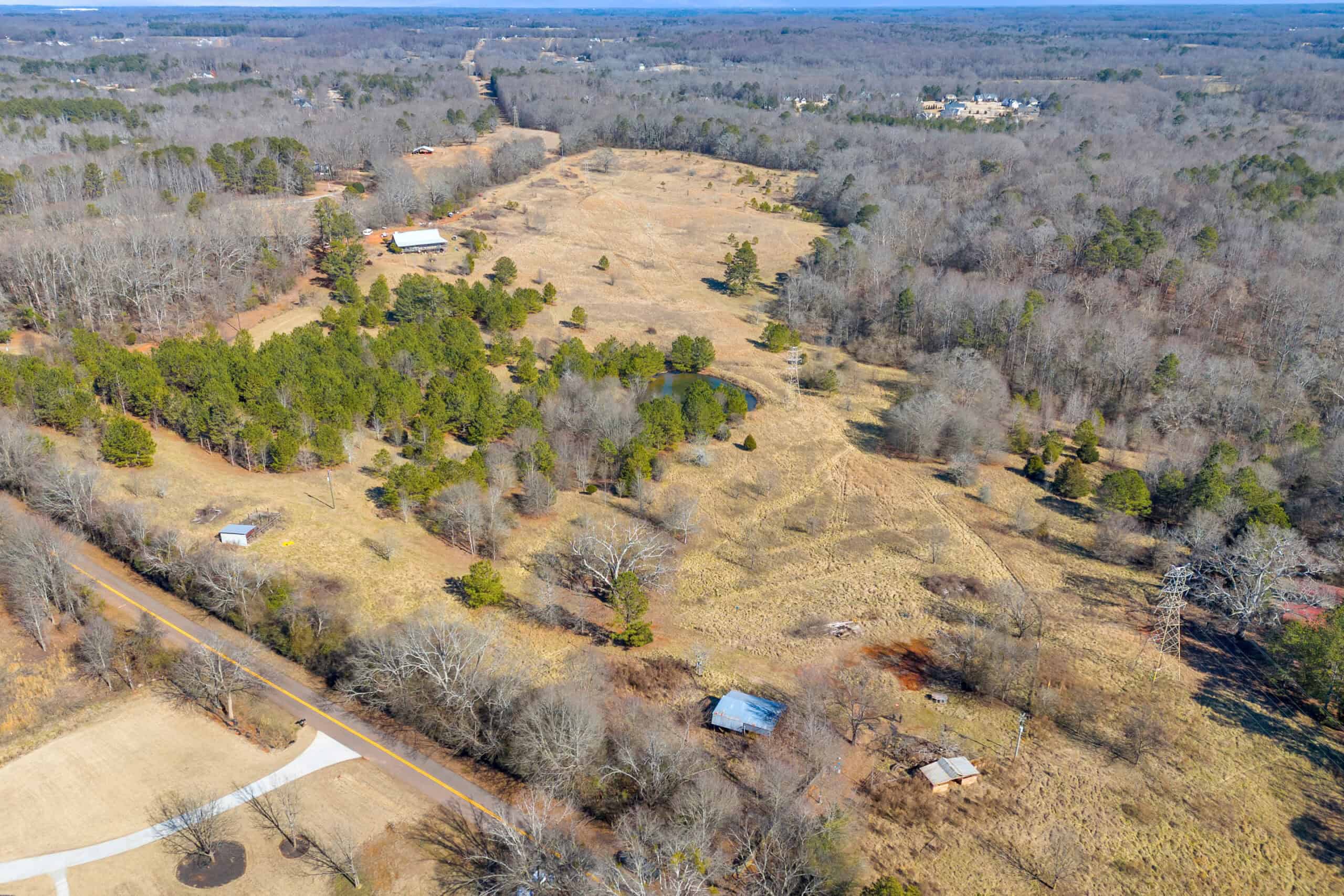 49+/- Acres of Beautiful Pasture with Two Ponds, Barn, and Creek Frontage.
