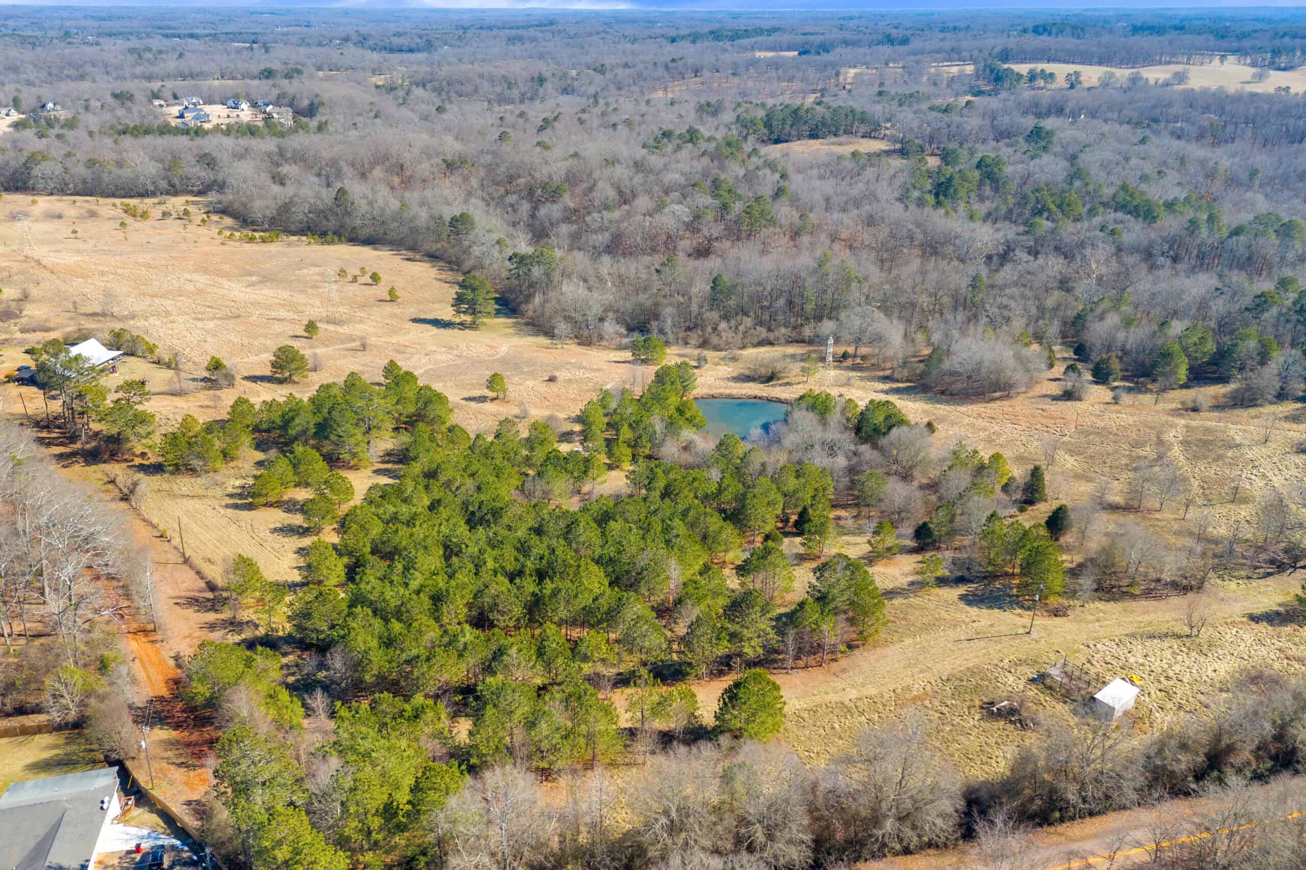 49+/- Acres of Beautiful Pasture with Two Ponds, Barn, and Creek Frontage.