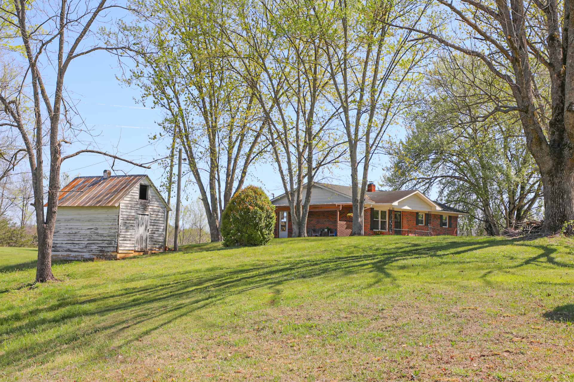 93 acre hunting property with home and large shop adjoining Lake Cumberland. Wayne County Kentucky. South Central Kentucky