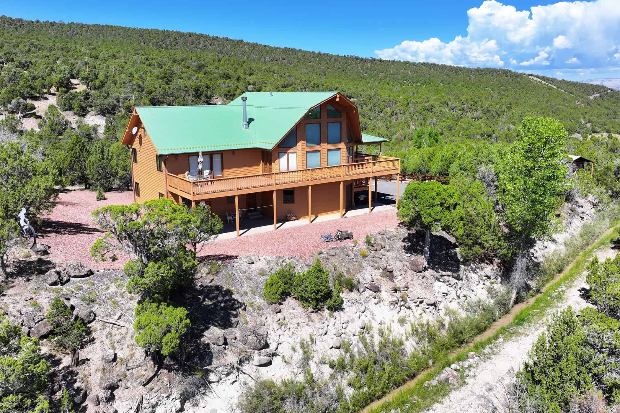 Mountain Home with Cabin on Acreage and Borders BLM For Sale in Colorado