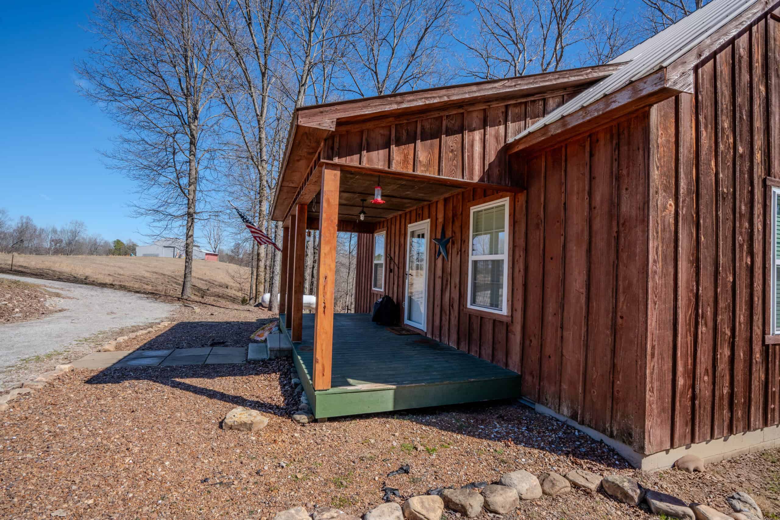SECLUDED CABIN FOR SALE IN TENNESSEE WITH BARN & FENCING