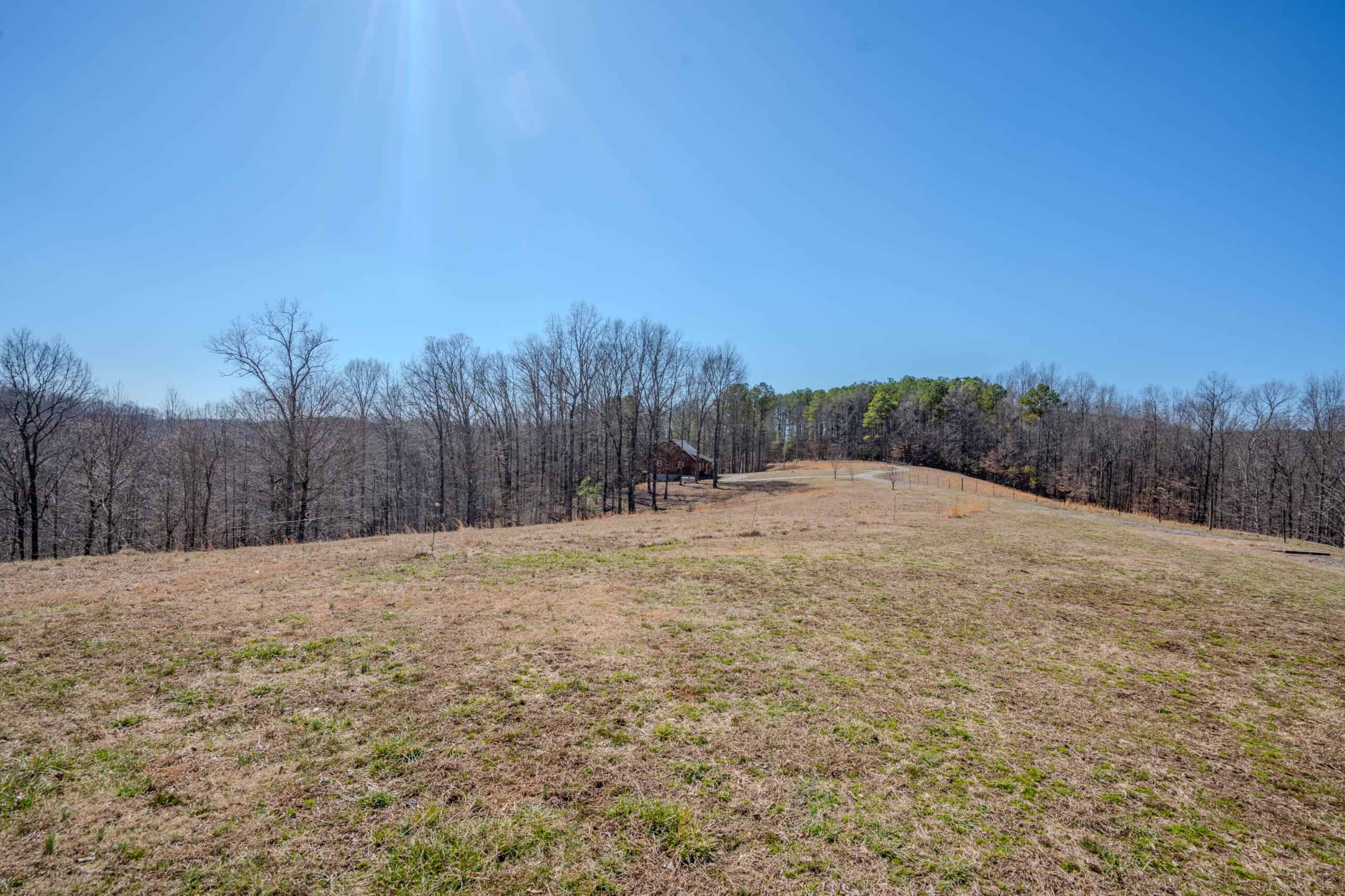 SECLUDED CABIN FOR SALE IN TENNESSEE WITH BARN & FENCING