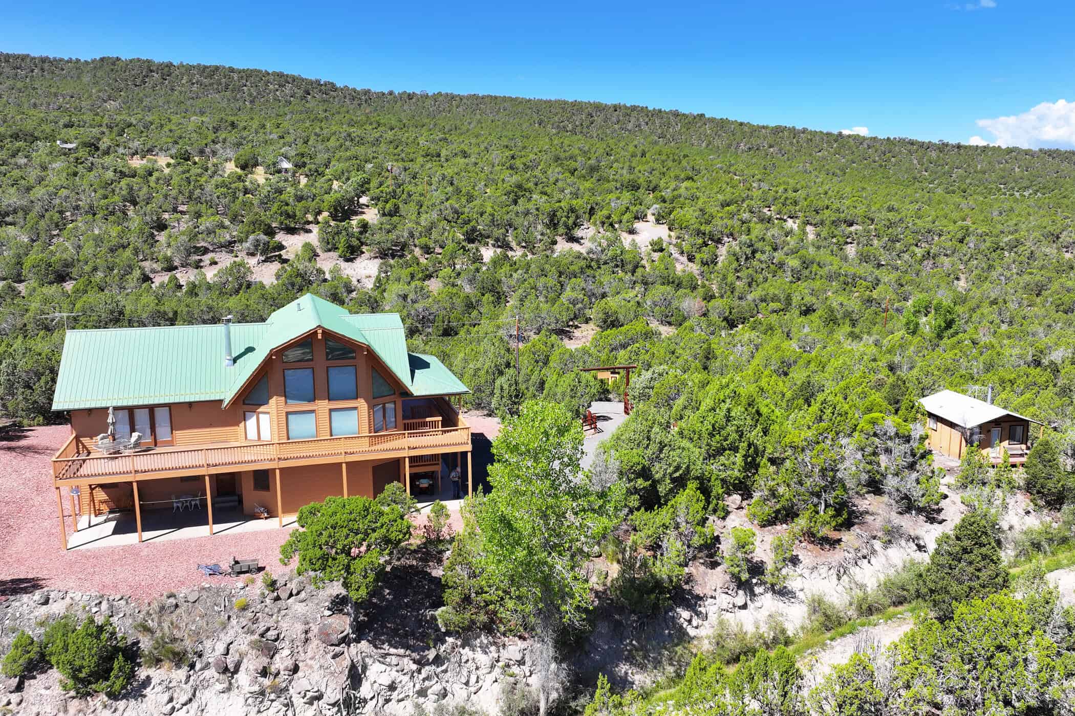 Mountain Home with Cabin on Acreage and Borders BLM For Sale in Colorado