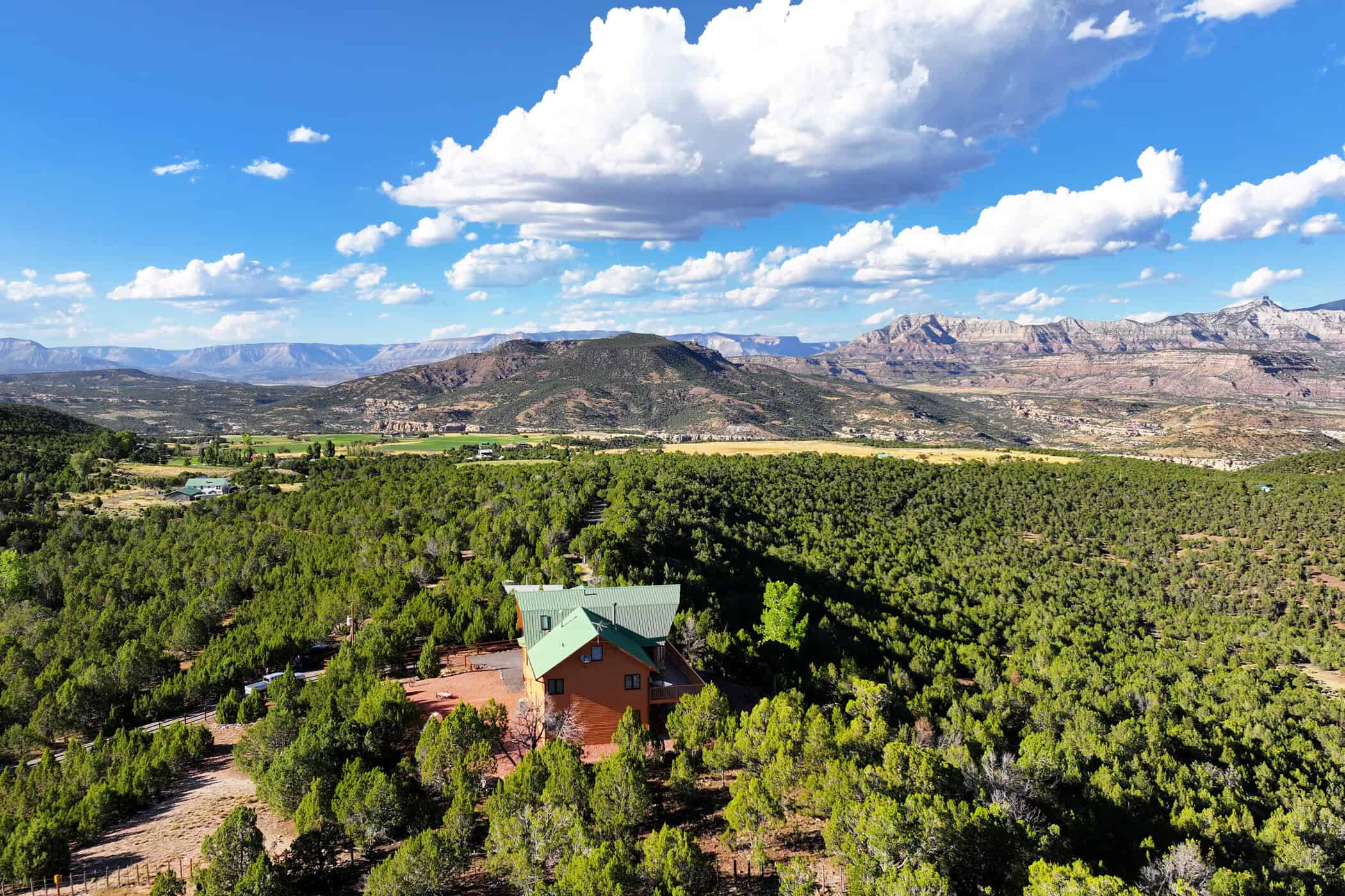Mountain Home with Cabin on Acreage and Borders BLM For Sale in Colorado