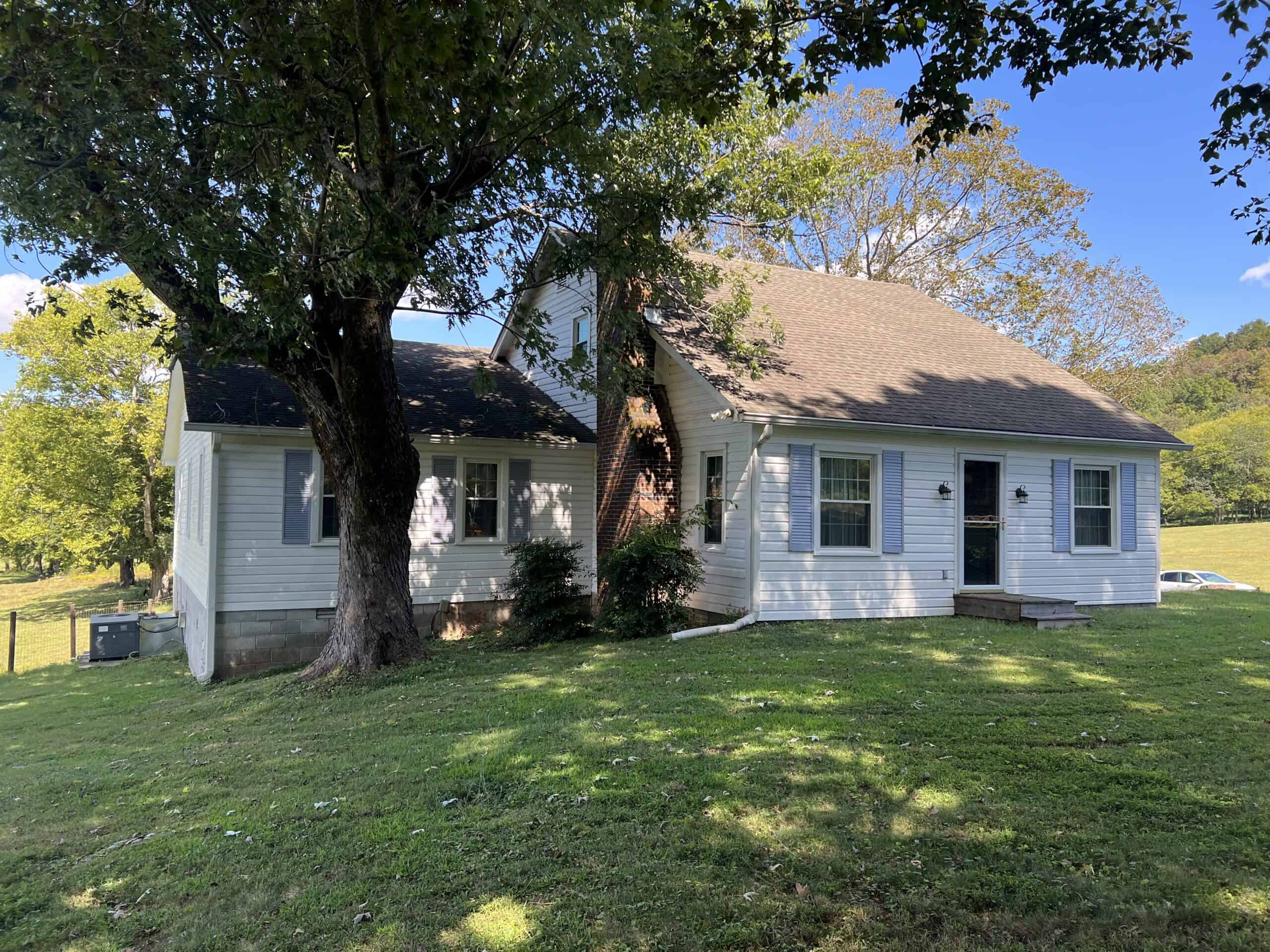 100 +/- ACRE FARM WITH HOUSE, CABIN, SHOP, BARN, POND