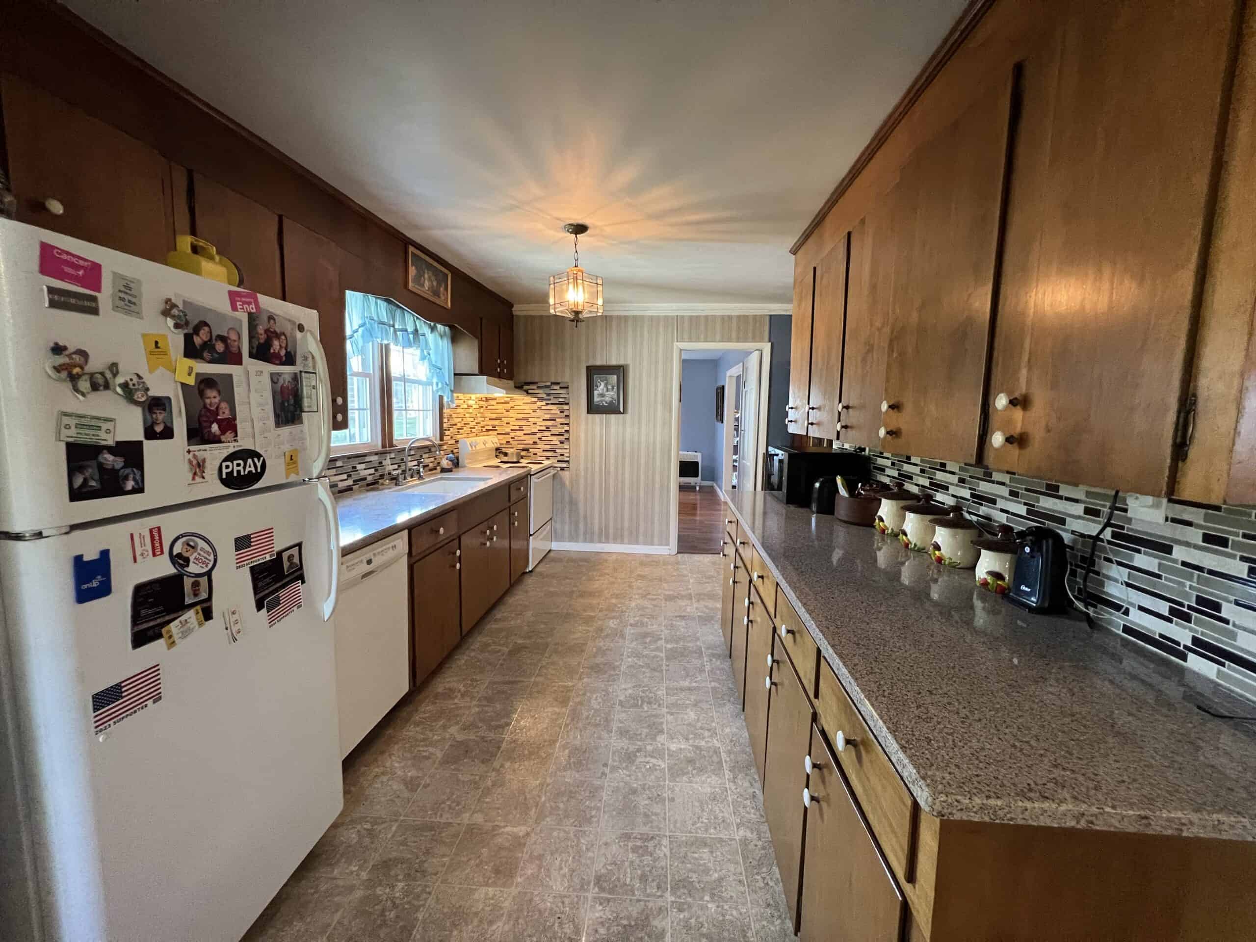 100 +/- ACRE FARM WITH HOUSE, CABIN, SHOP, BARN, POND