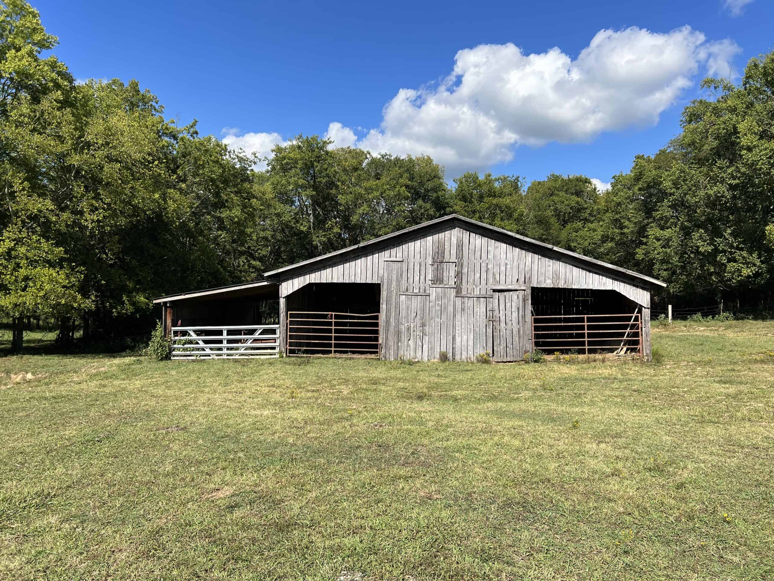 100 +/- ACRE FARM WITH HOUSE, CABIN, SHOP, BARN, POND