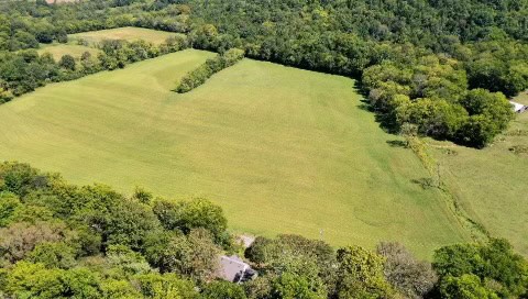 100 +/- ACRE FARM WITH HOUSE, CABIN, SHOP, BARN, POND