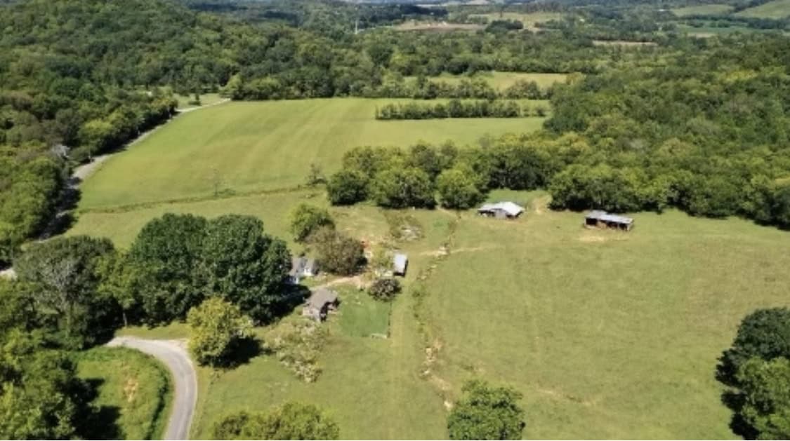 100 +/- ACRE FARM WITH HOUSE, CABIN, SHOP, BARN, POND