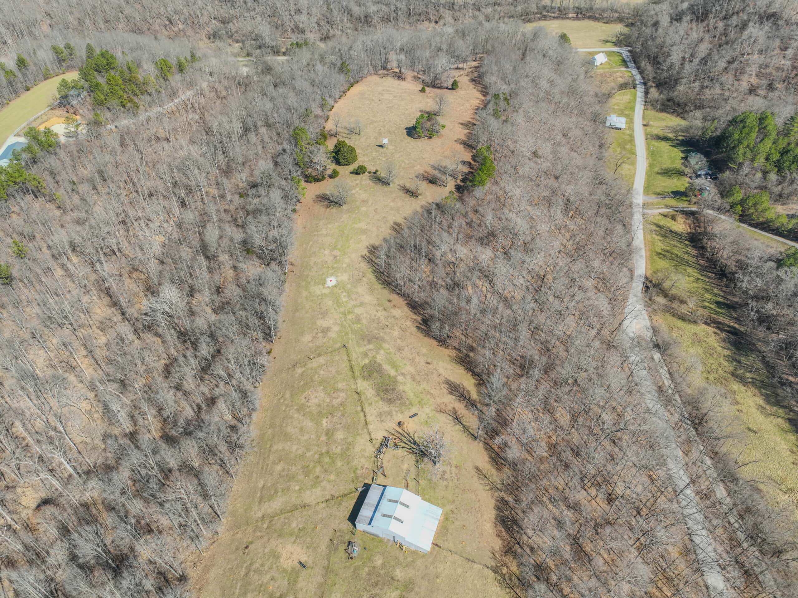 SECLUDED CABIN FOR SALE IN TENNESSEE WITH BARN & FENCING