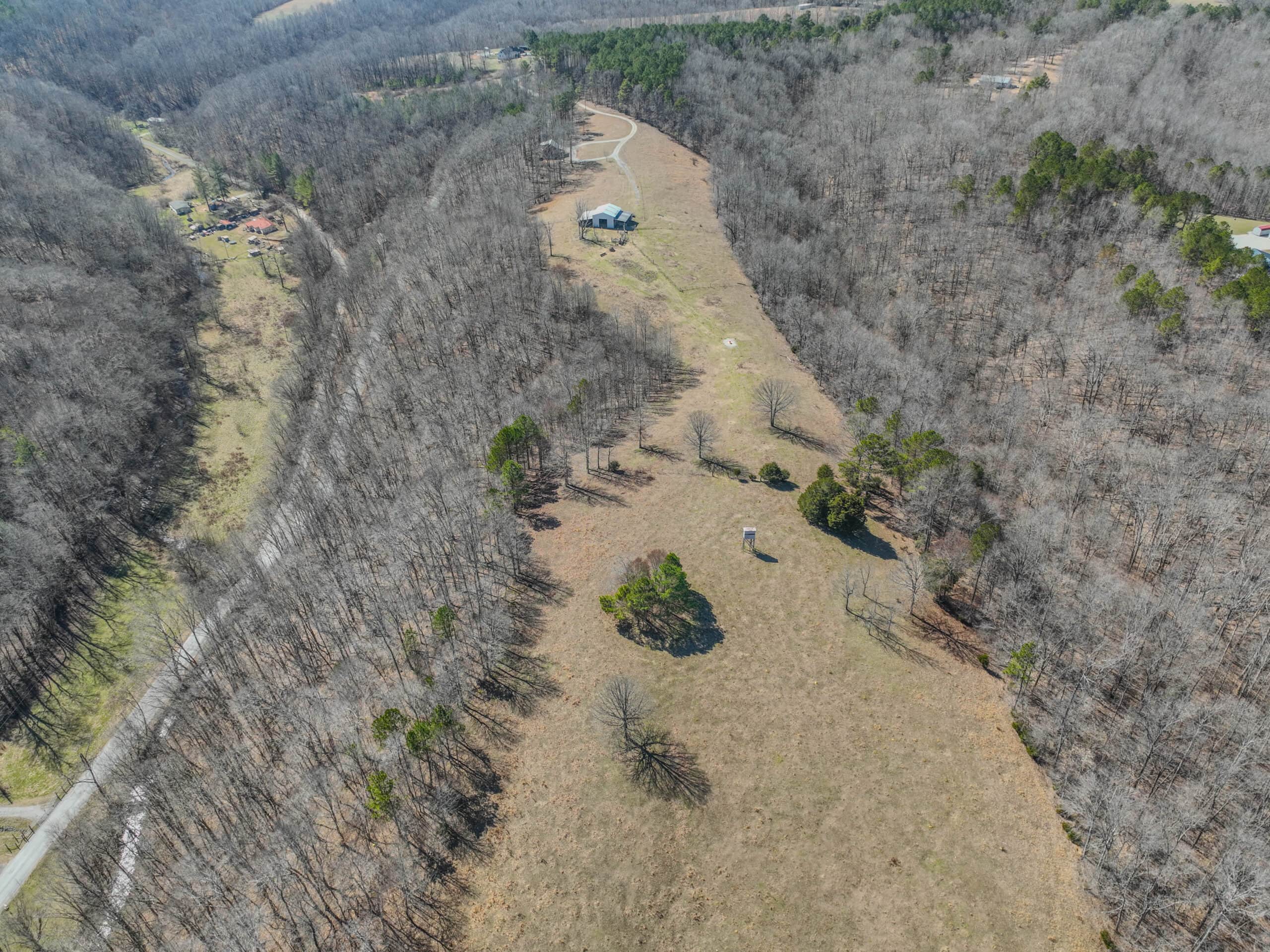 SECLUDED CABIN FOR SALE IN TENNESSEE WITH BARN & FENCING