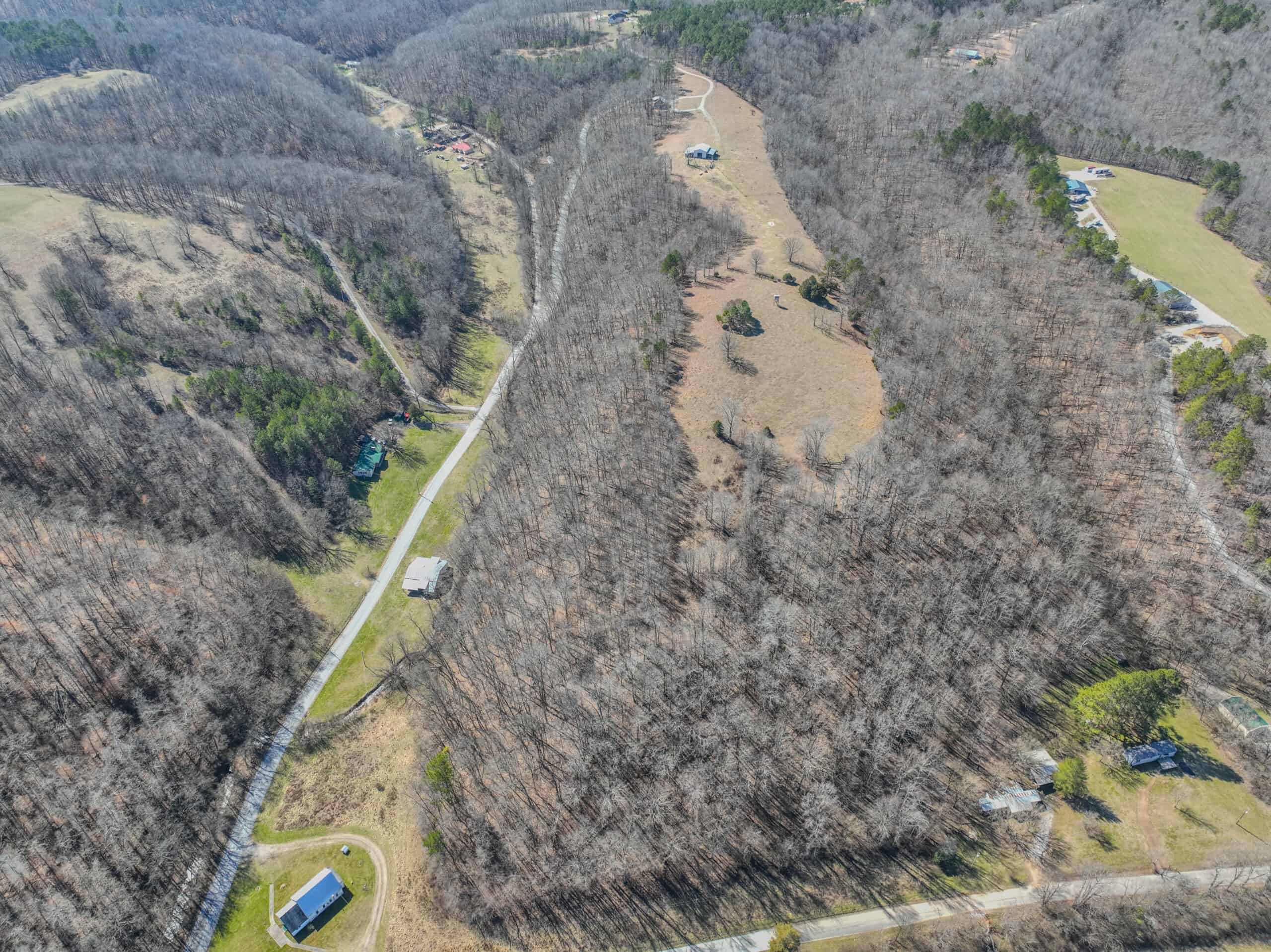 SECLUDED CABIN FOR SALE IN TENNESSEE WITH BARN & FENCING