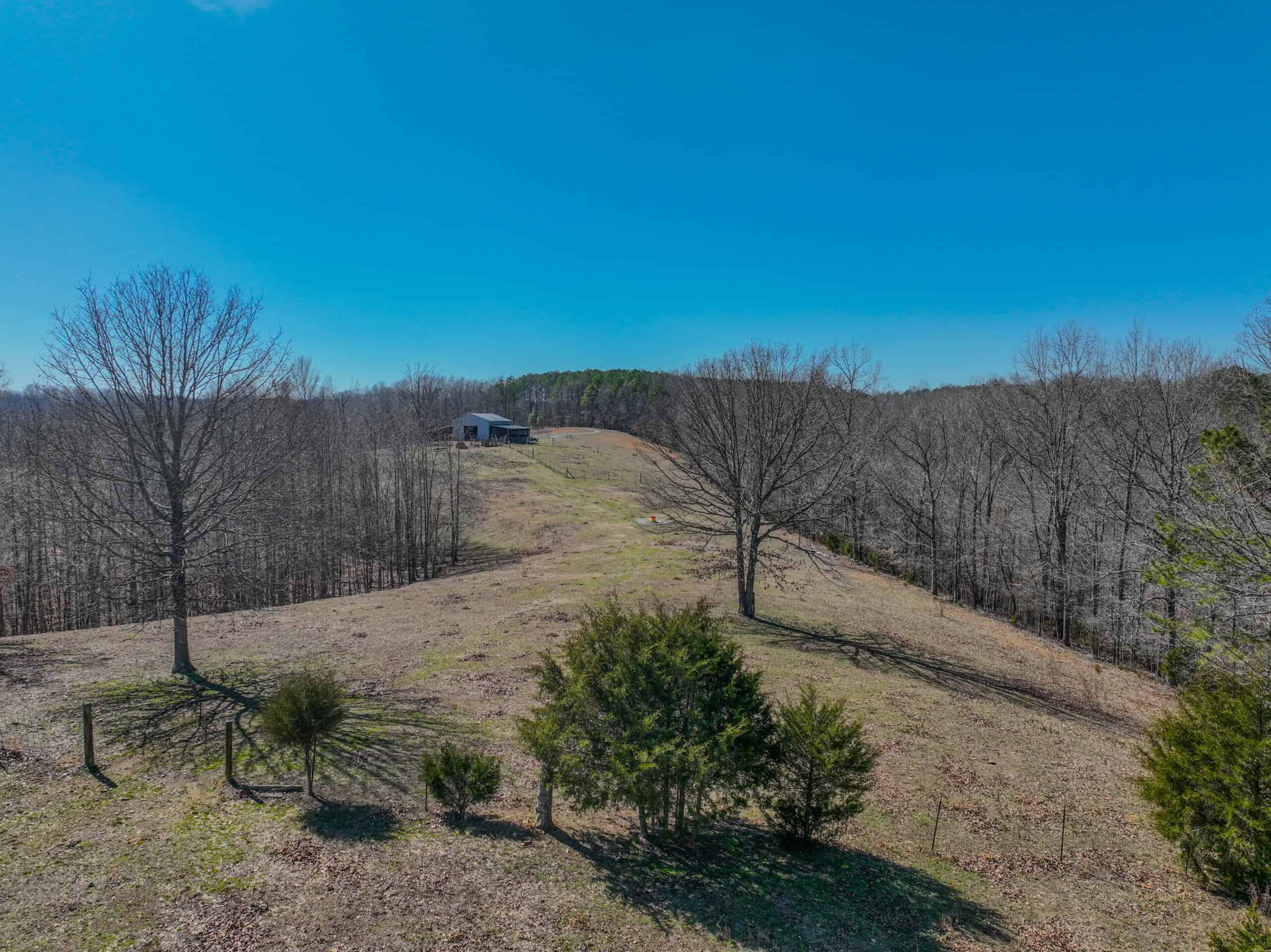 SECLUDED CABIN FOR SALE IN TENNESSEE WITH BARN & FENCING