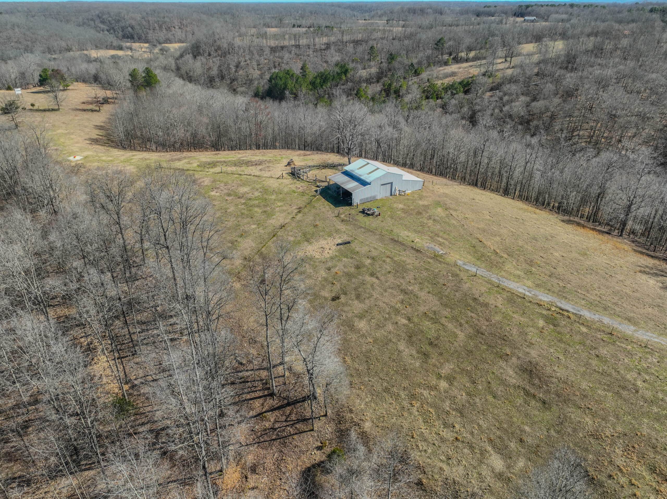 SECLUDED CABIN FOR SALE IN TENNESSEE WITH BARN & FENCING