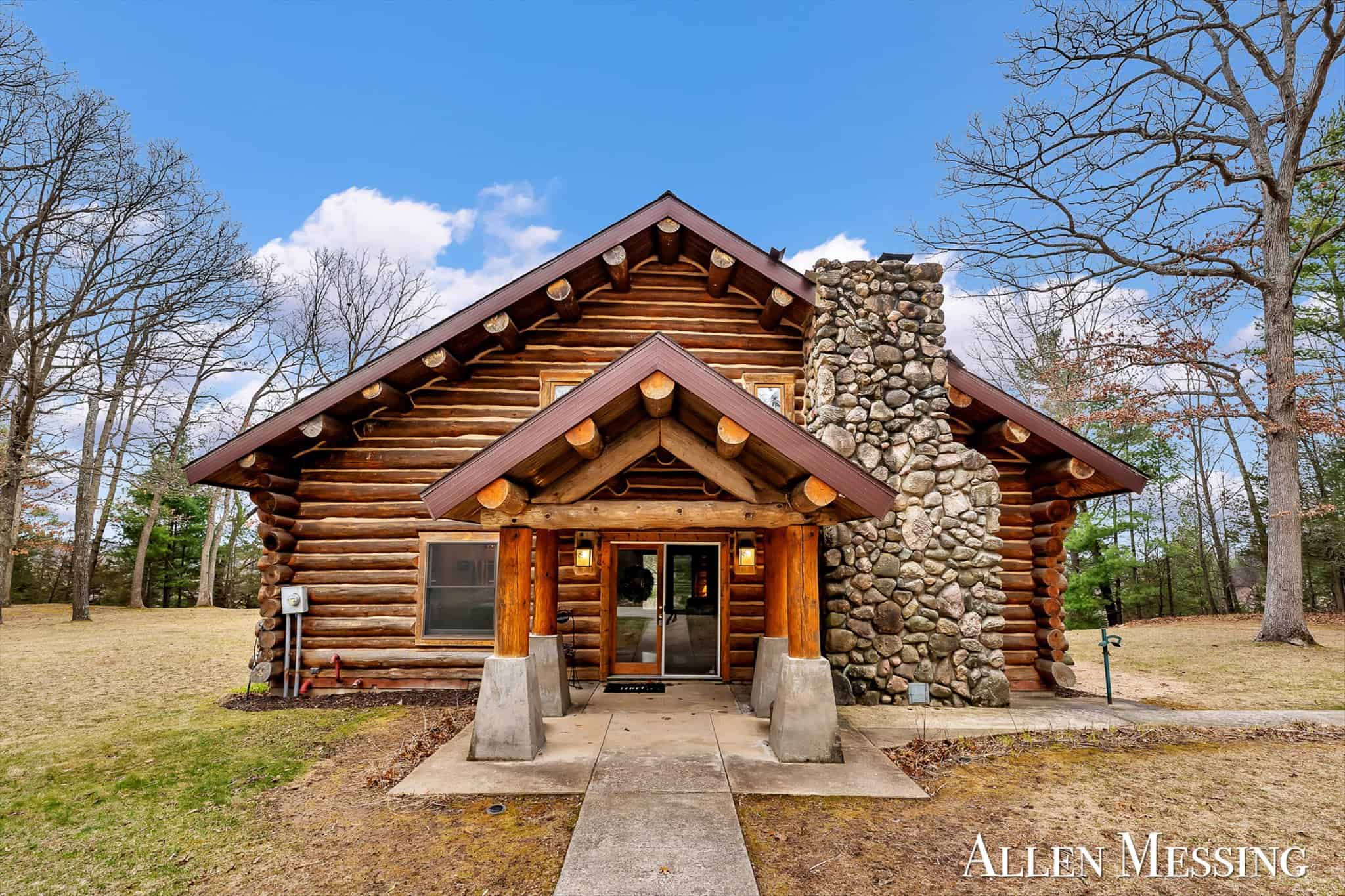 Custom Log Home on 10+ Acres with private Muskegon river frontage