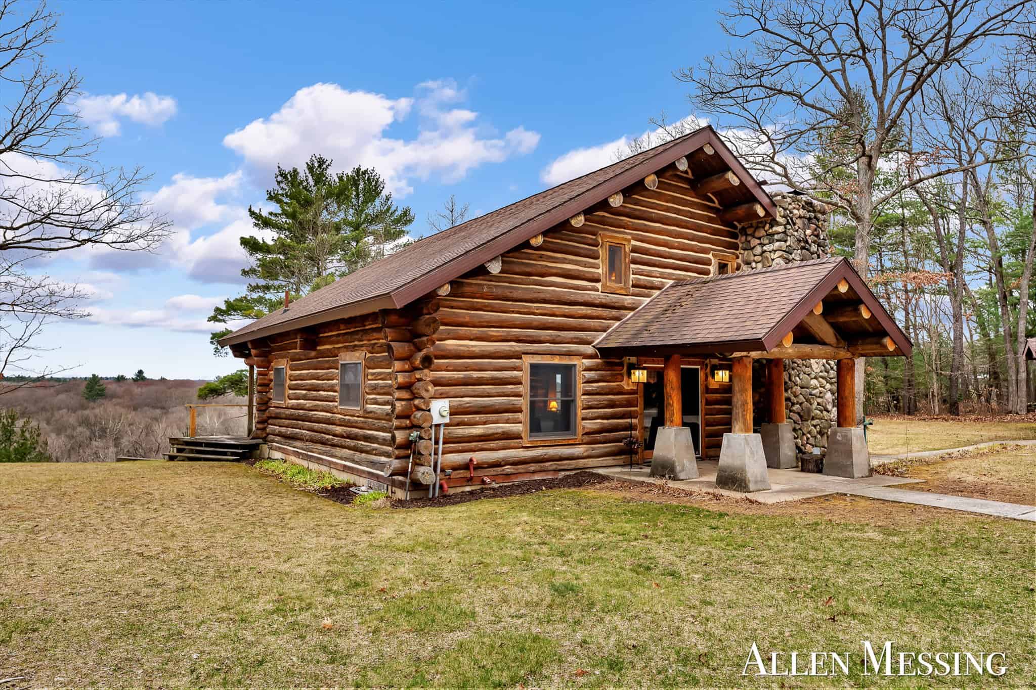 Custom Log Home on 10+ Acres with private Muskegon river frontage