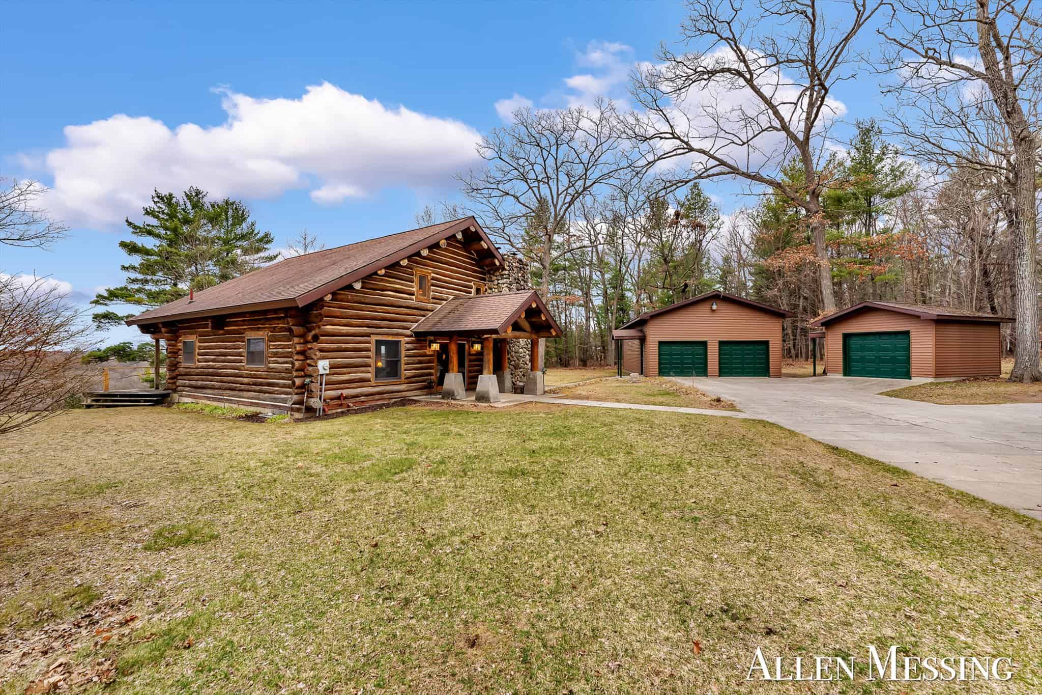 Custom Log Home on 10+ Acres with private Muskegon river frontage