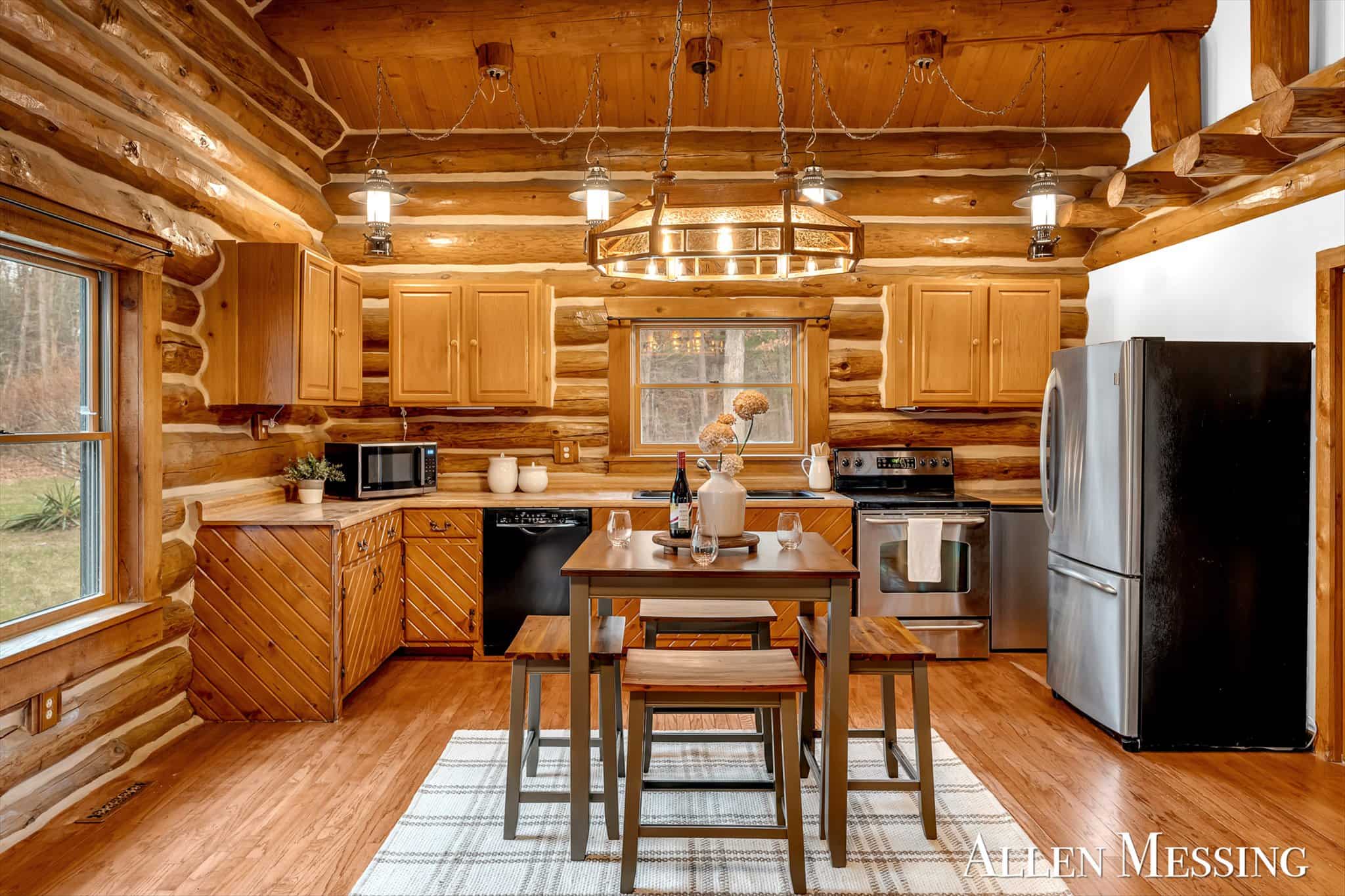 Custom Log Home on 10+ Acres with private Muskegon river frontage