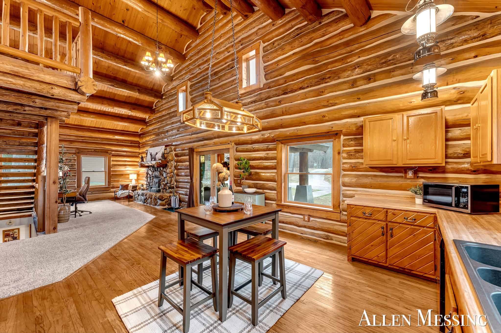 Custom Log Home on 10+ Acres with private Muskegon river frontage
