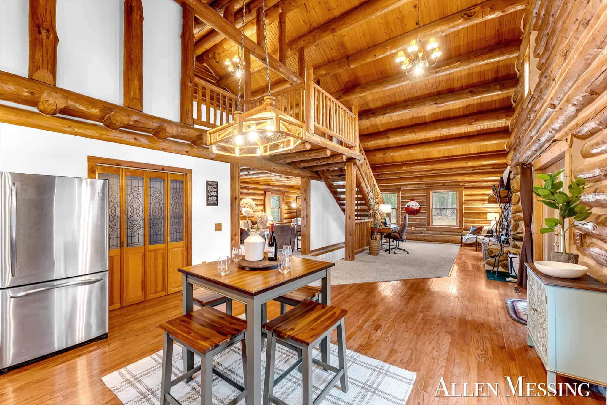 Custom Log Home on 10+ Acres with private Muskegon river frontage
