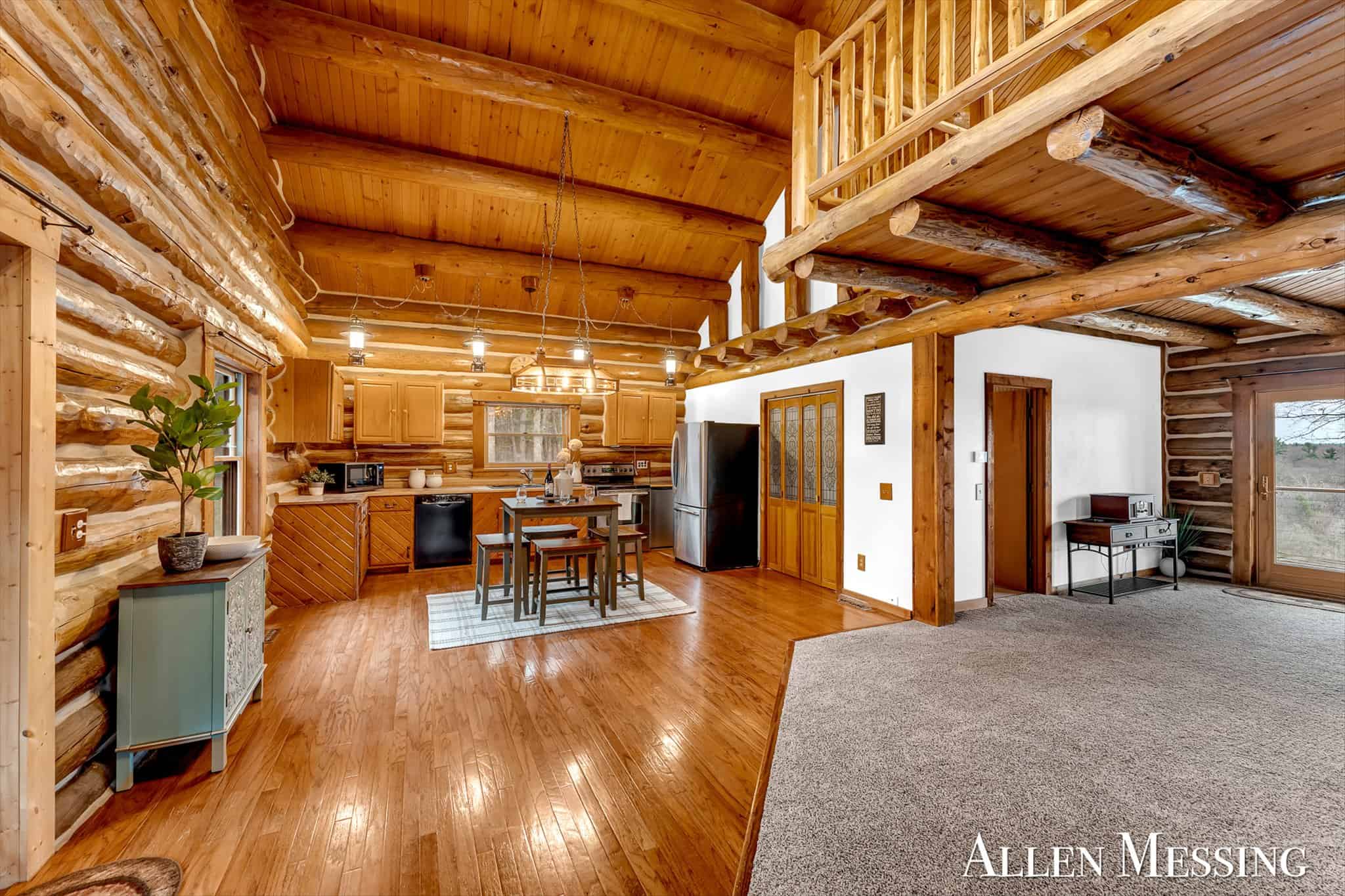 Custom Log Home on 10+ Acres with private Muskegon river frontage
