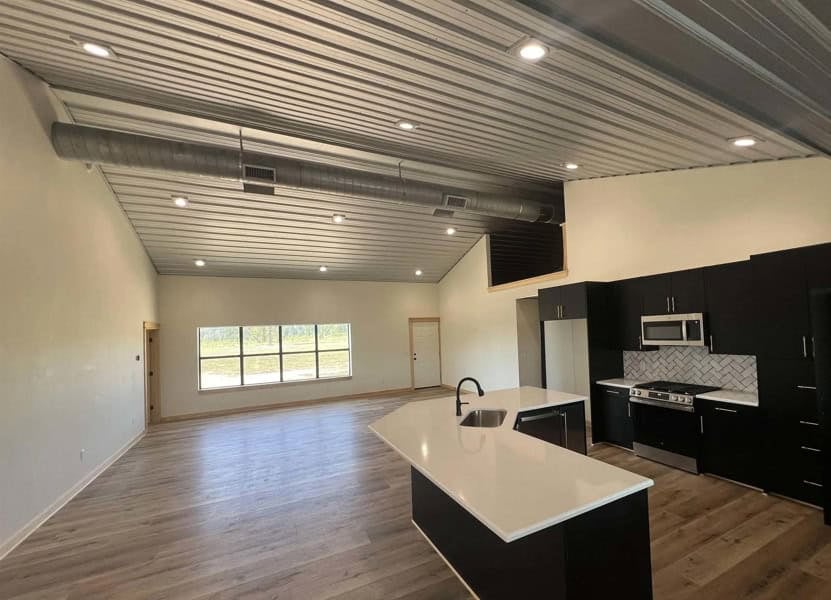Arkansas Retreat – 100 Acres with New Home, Shop & Private Lake