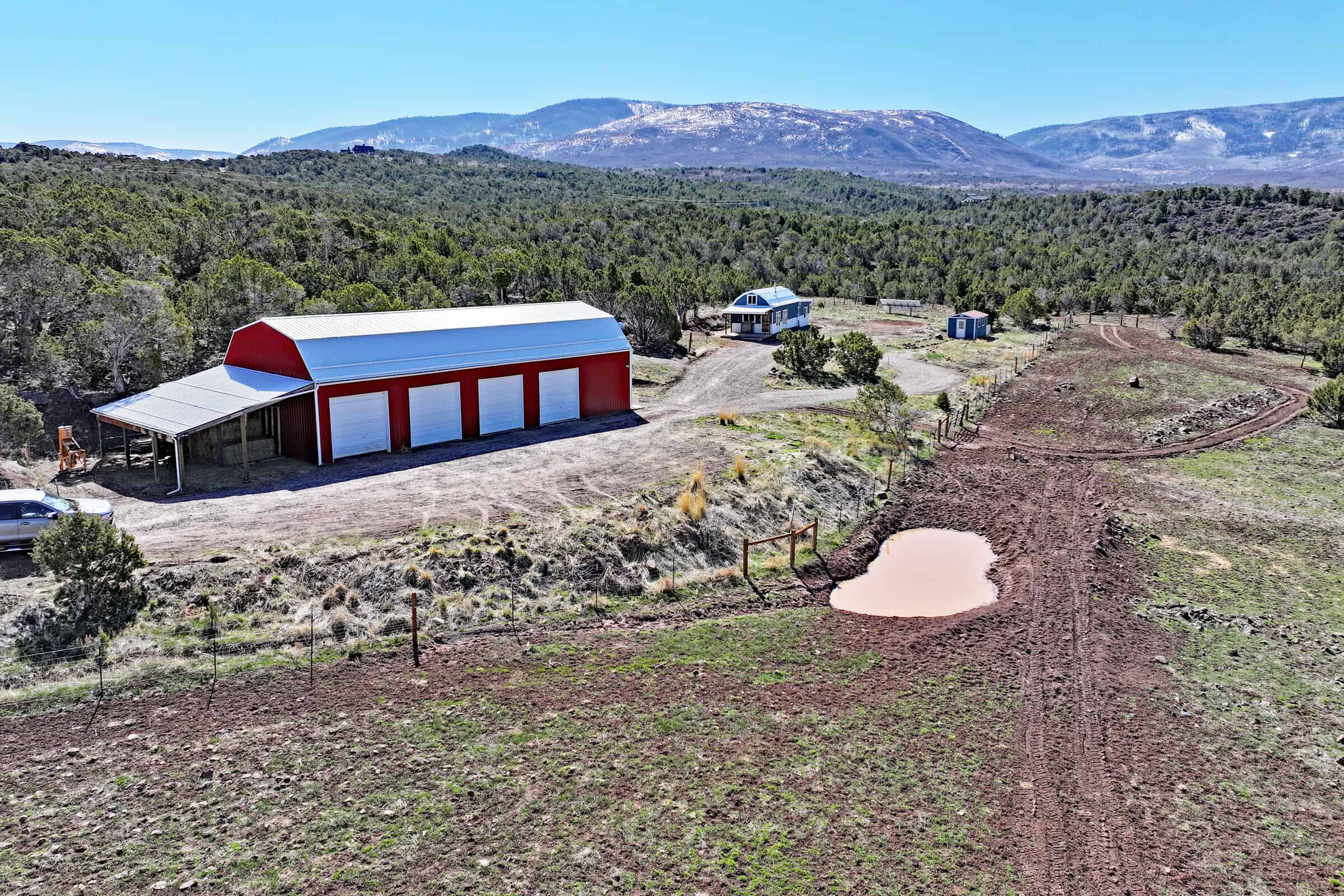 Home, Shop, Acreage with Ponds in 2 Parcels For Sale in Mesa County