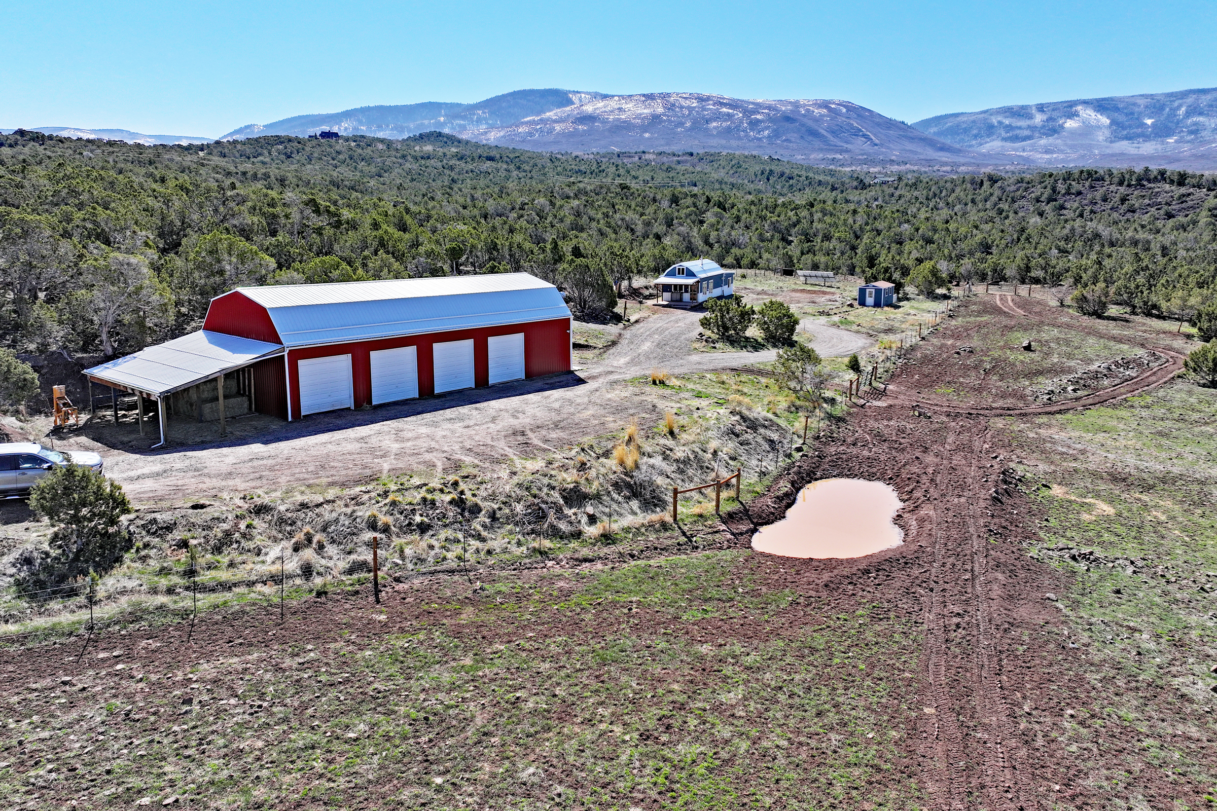 Home, Shop, Acreage with Ponds in 2 Parcels For Sale in Mesa County
