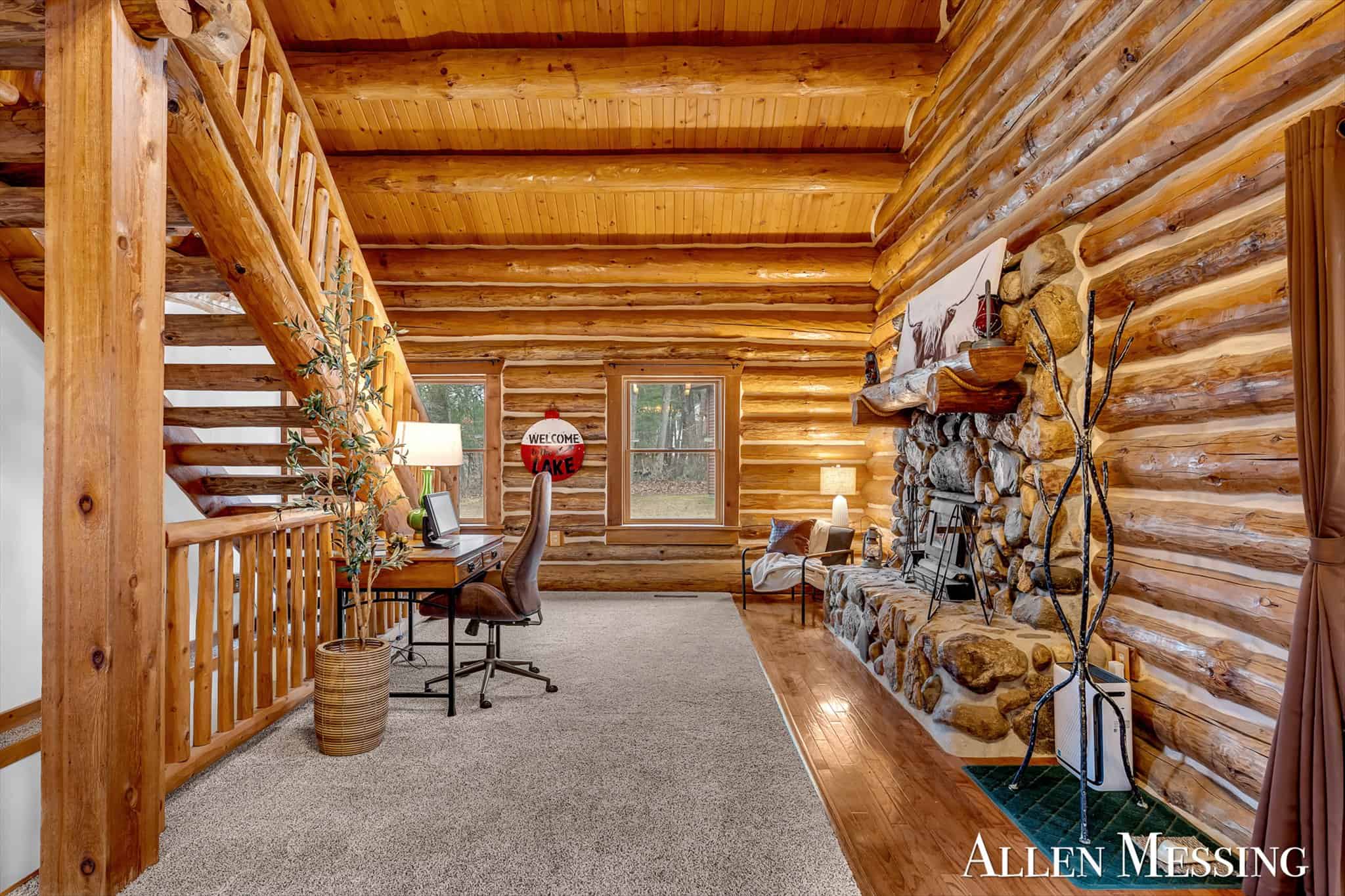 Custom Log Home on 10+ Acres with private Muskegon river frontage