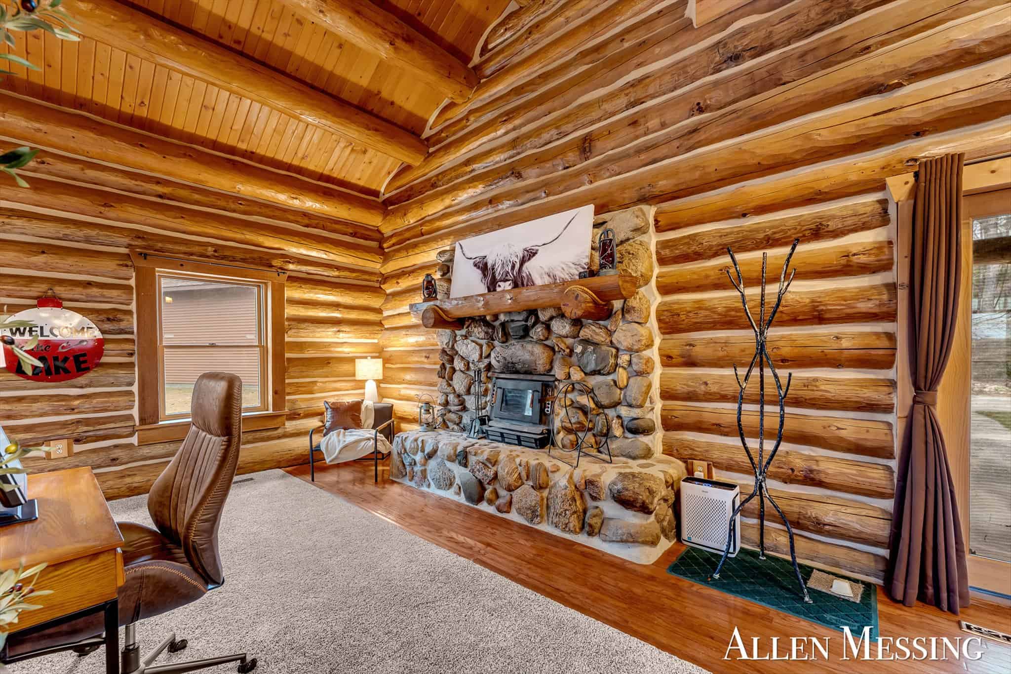 Custom Log Home on 10+ Acres with private Muskegon river frontage