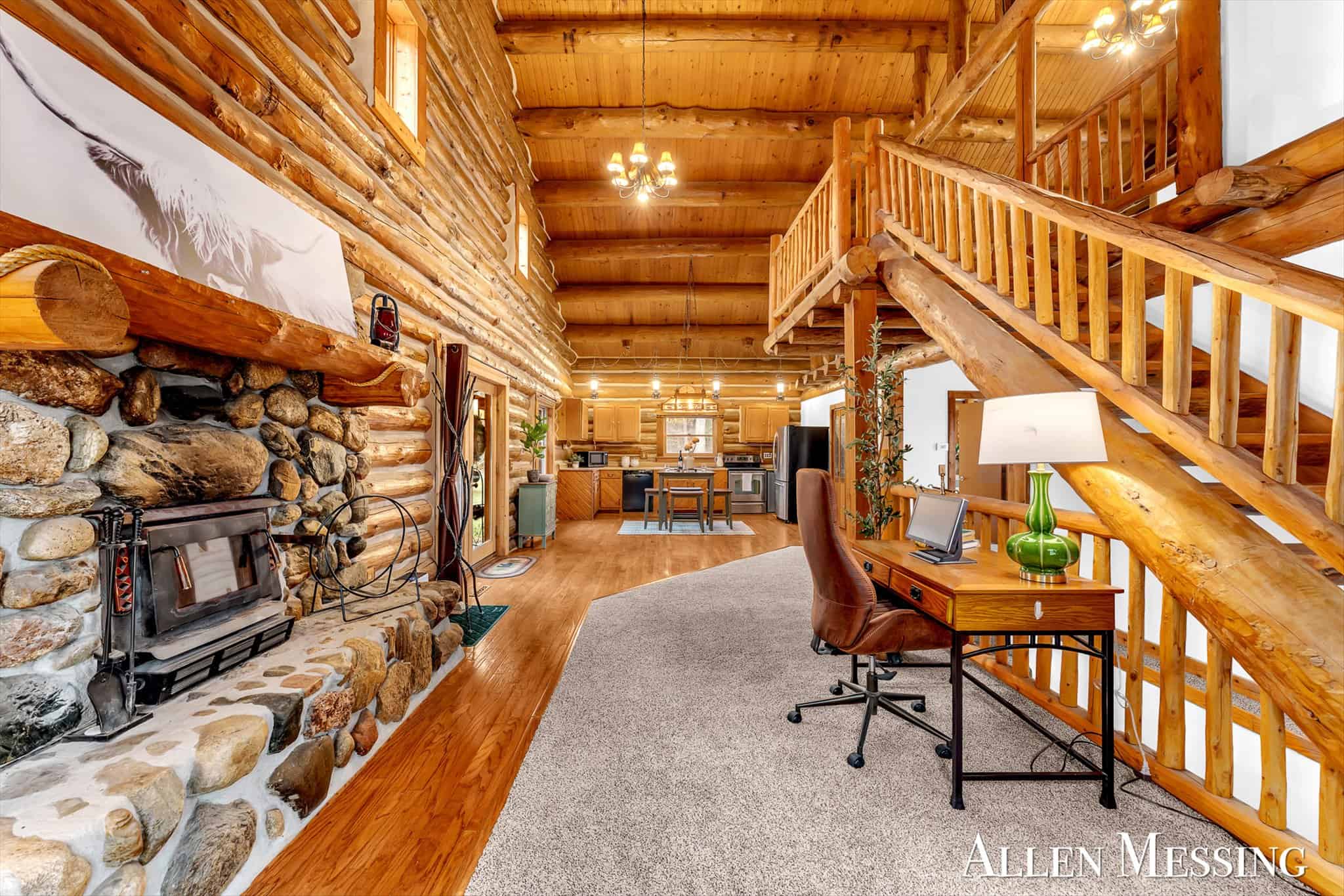 Custom Log Home on 10+ Acres with private Muskegon river frontage
