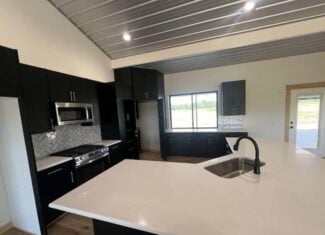 Arkansas Retreat – 100 Acres with New Home, Shop & Private Lake