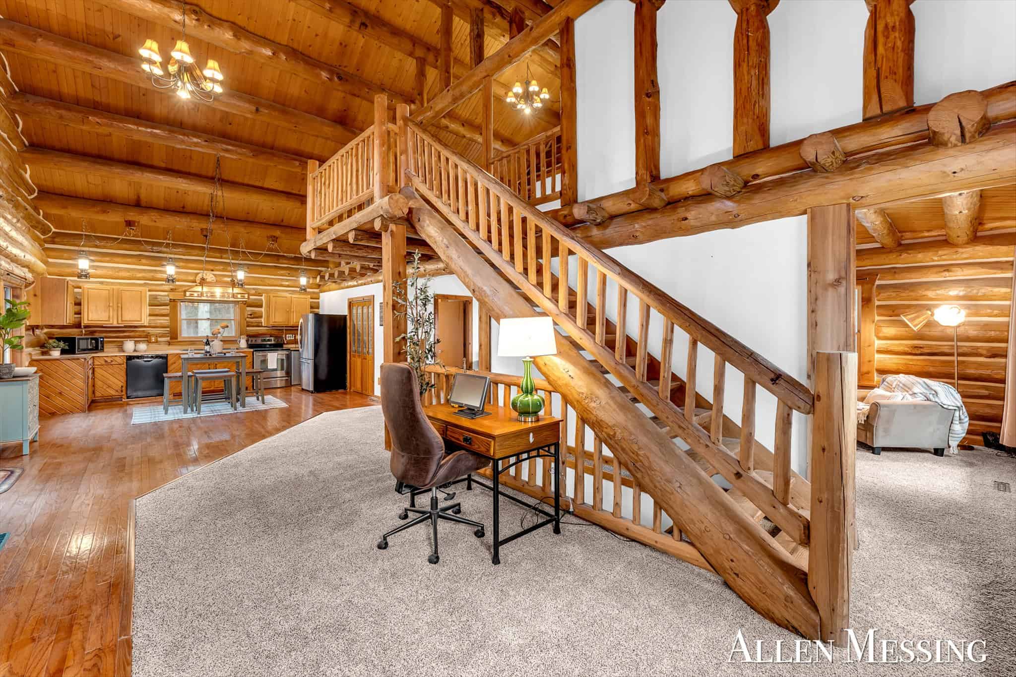 Custom Log Home on 10+ Acres with private Muskegon river frontage