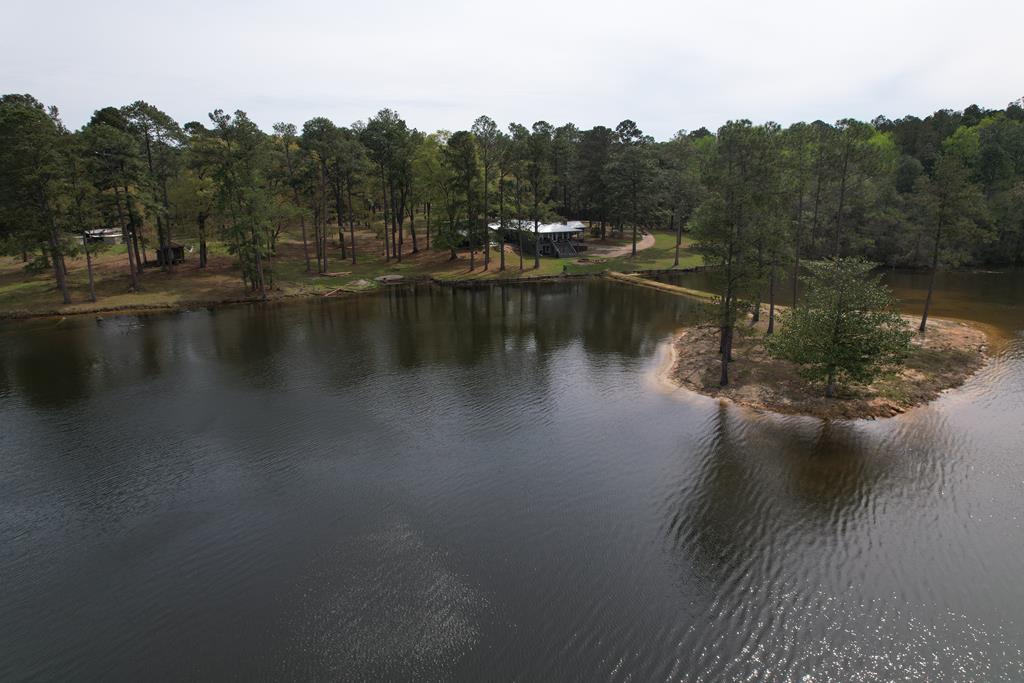 An Outdoorsman’s Paradise 719 Acres with 110 Acre Lake and Custom Built Home Pearl River County Mississippi