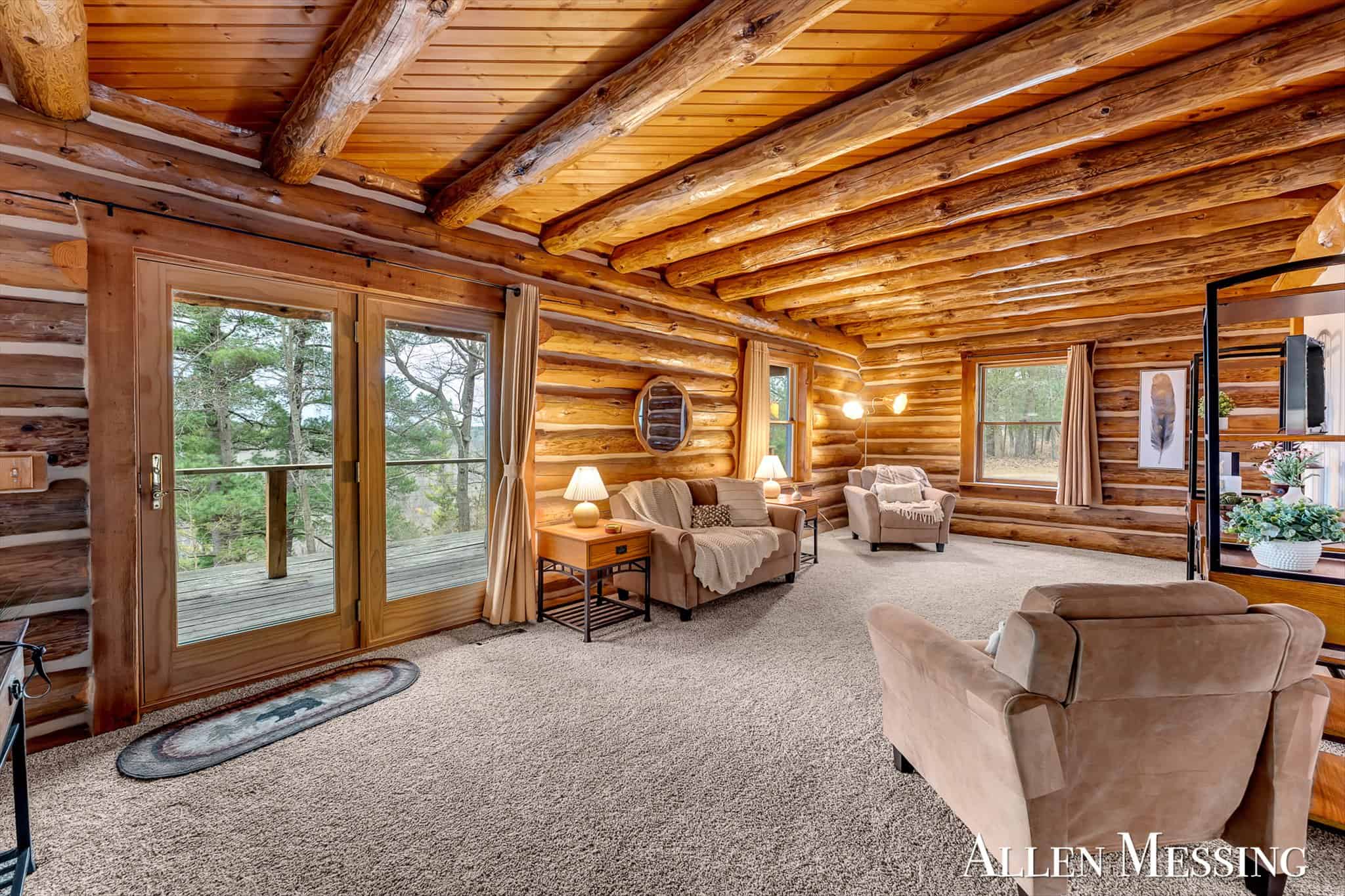 Custom Log Home on 10+ Acres with private Muskegon river frontage