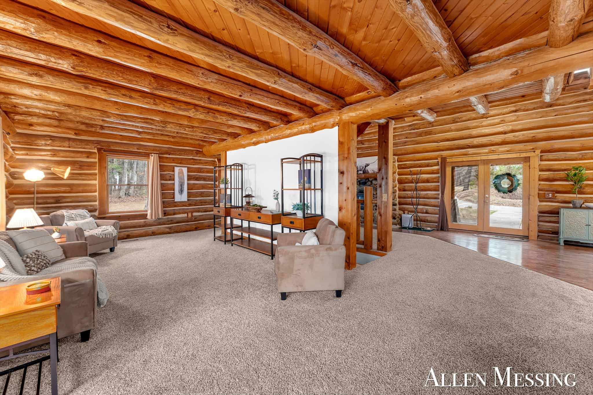 Custom Log Home on 10+ Acres with private Muskegon river frontage