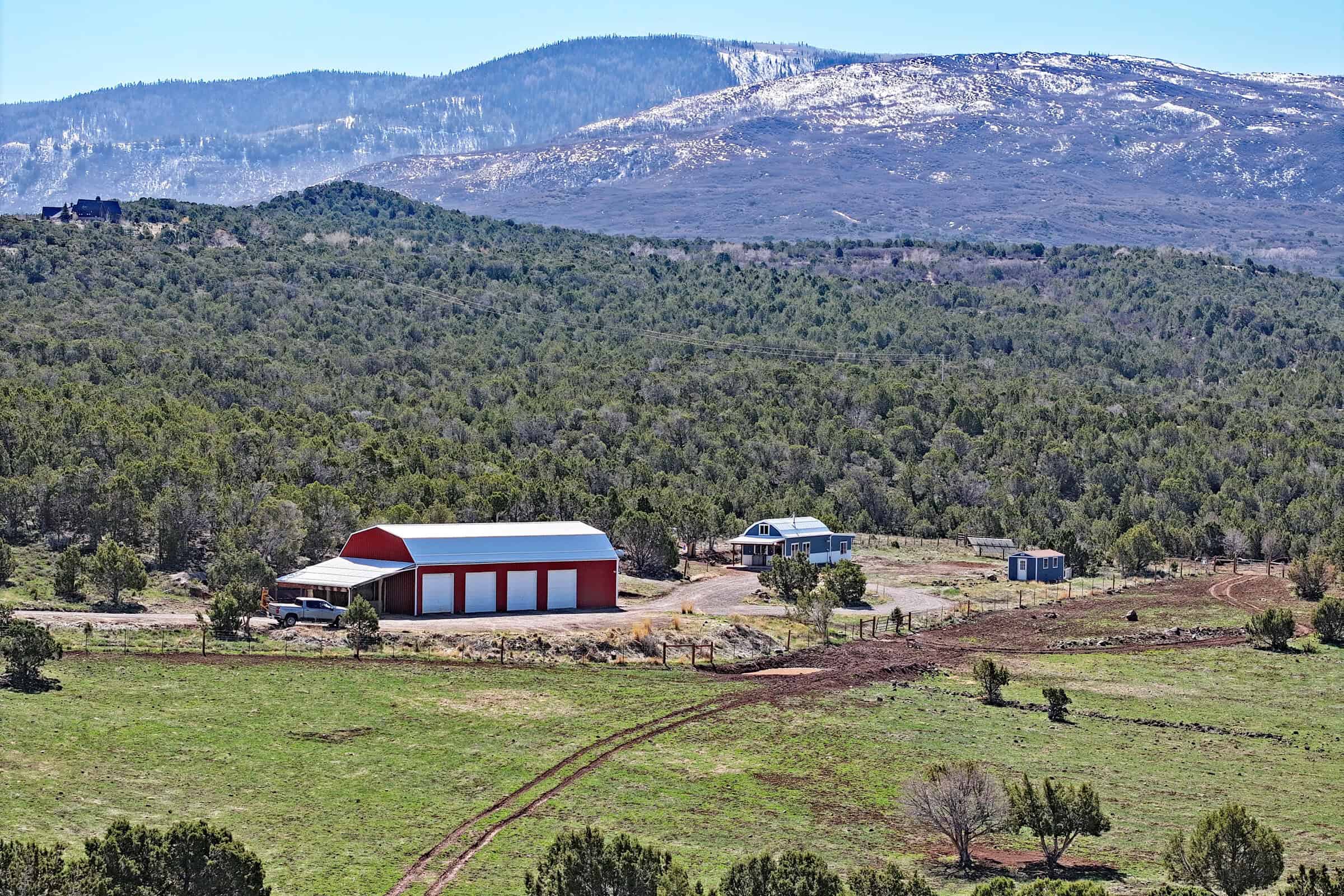 Home, Shop, Acreage with Ponds in 2 Parcels For Sale in Mesa County