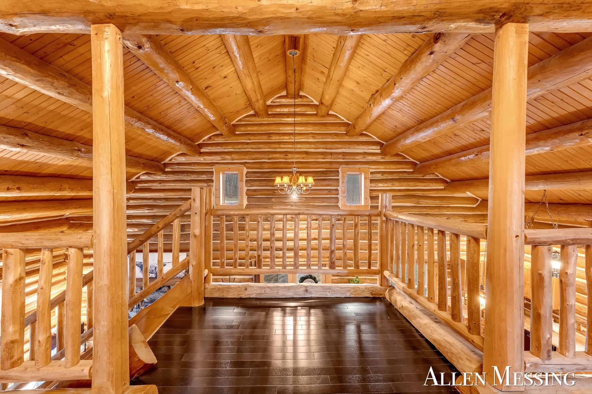 Custom Log Home on 10+ Acres with private Muskegon river frontage