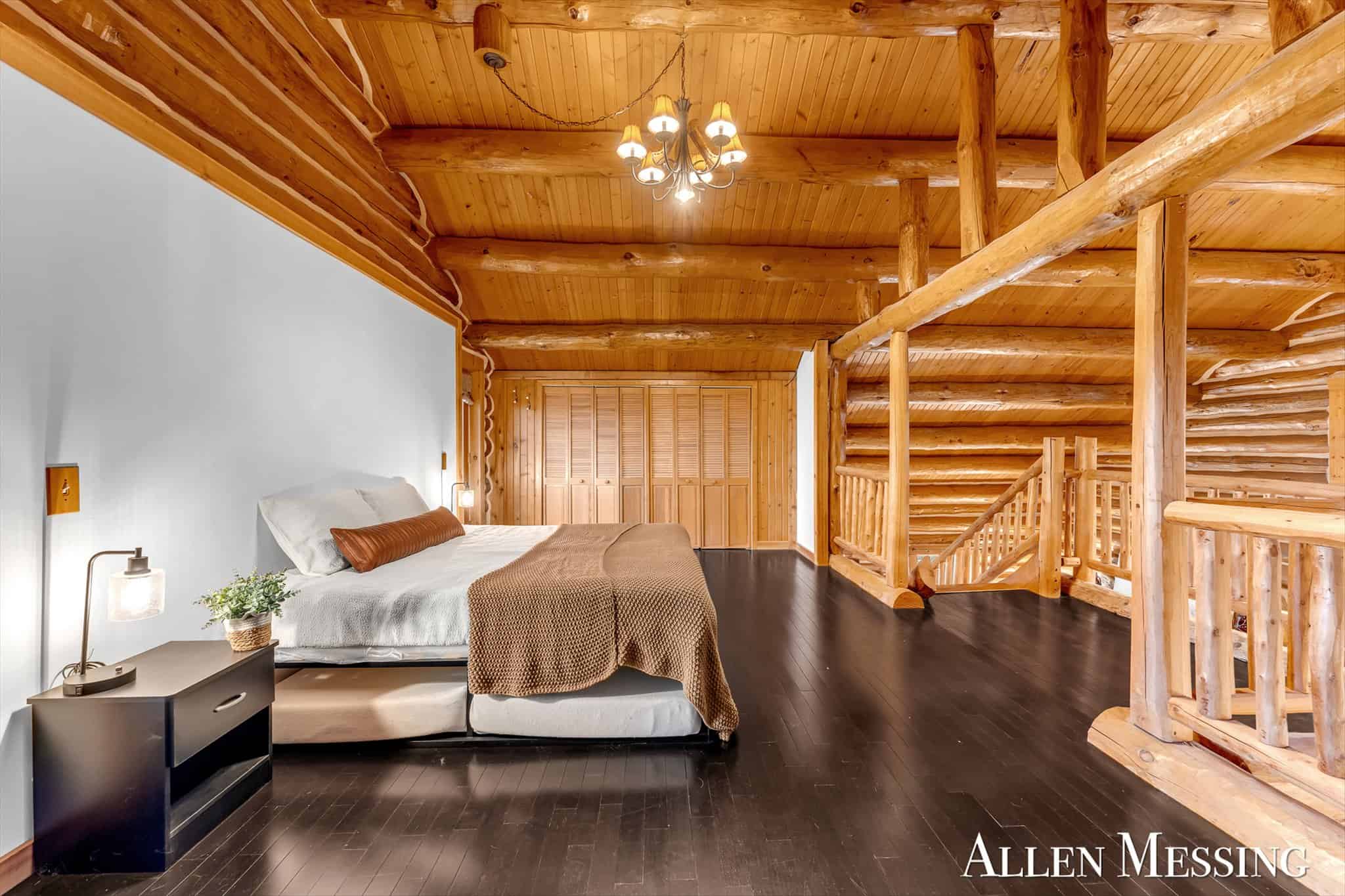 Custom Log Home on 10+ Acres with private Muskegon river frontage