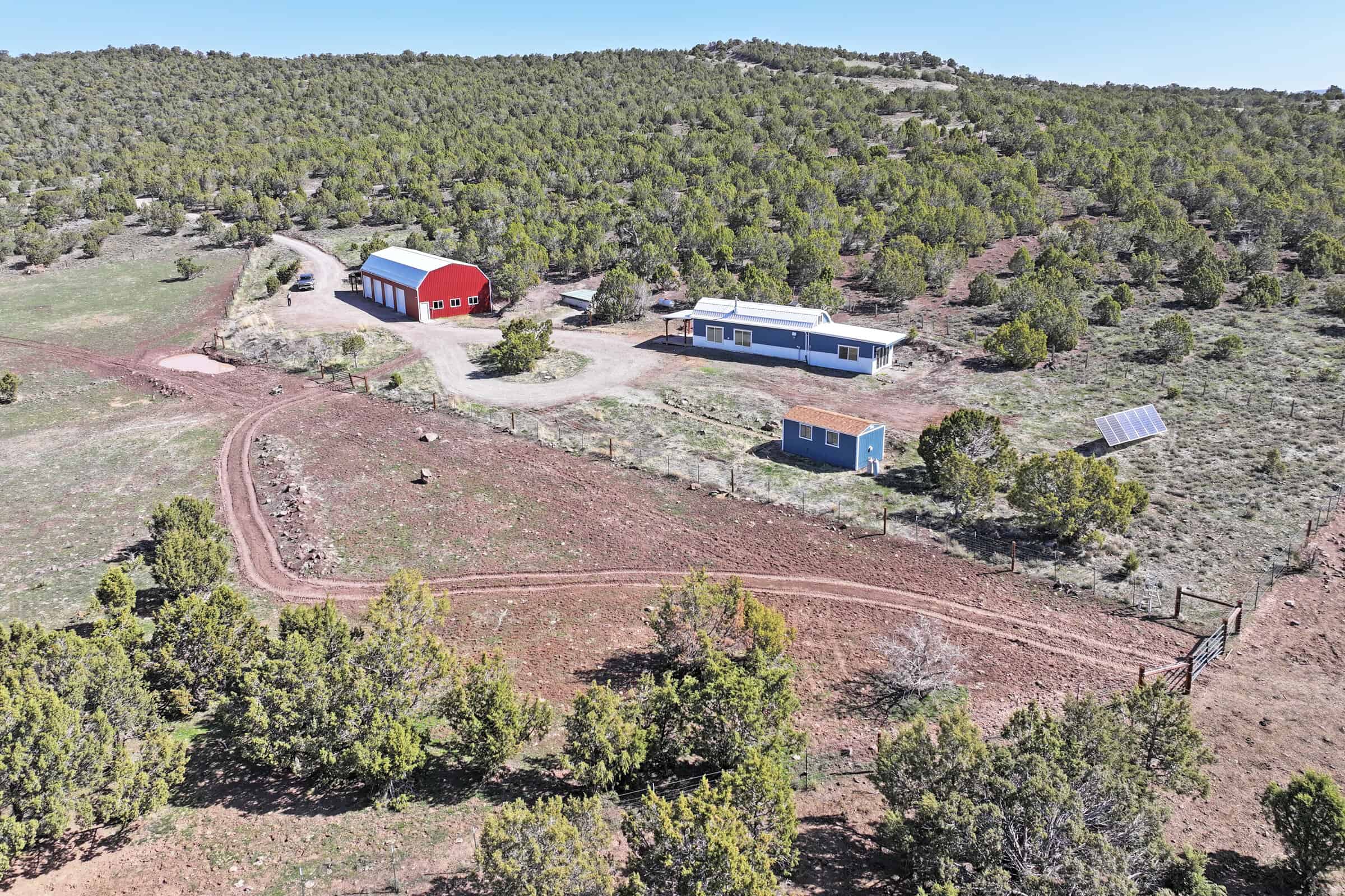 Home, Shop, Acreage with Ponds in 2 Parcels For Sale in Mesa County