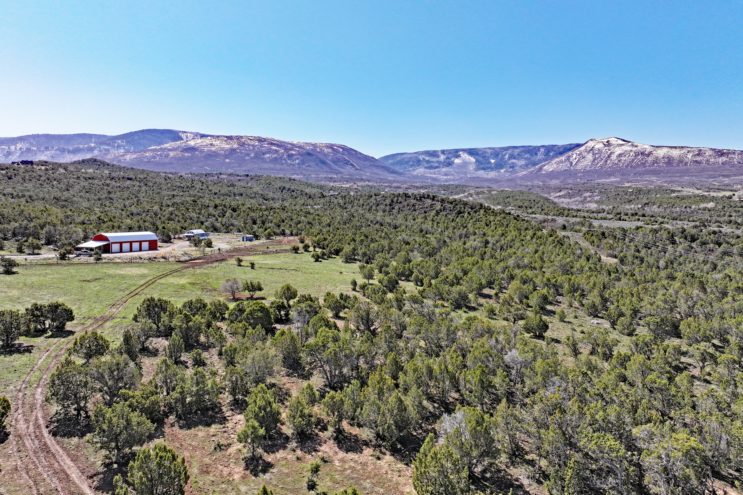 Home, Shop, Acreage with Ponds in 2 Parcels For Sale in Mesa County