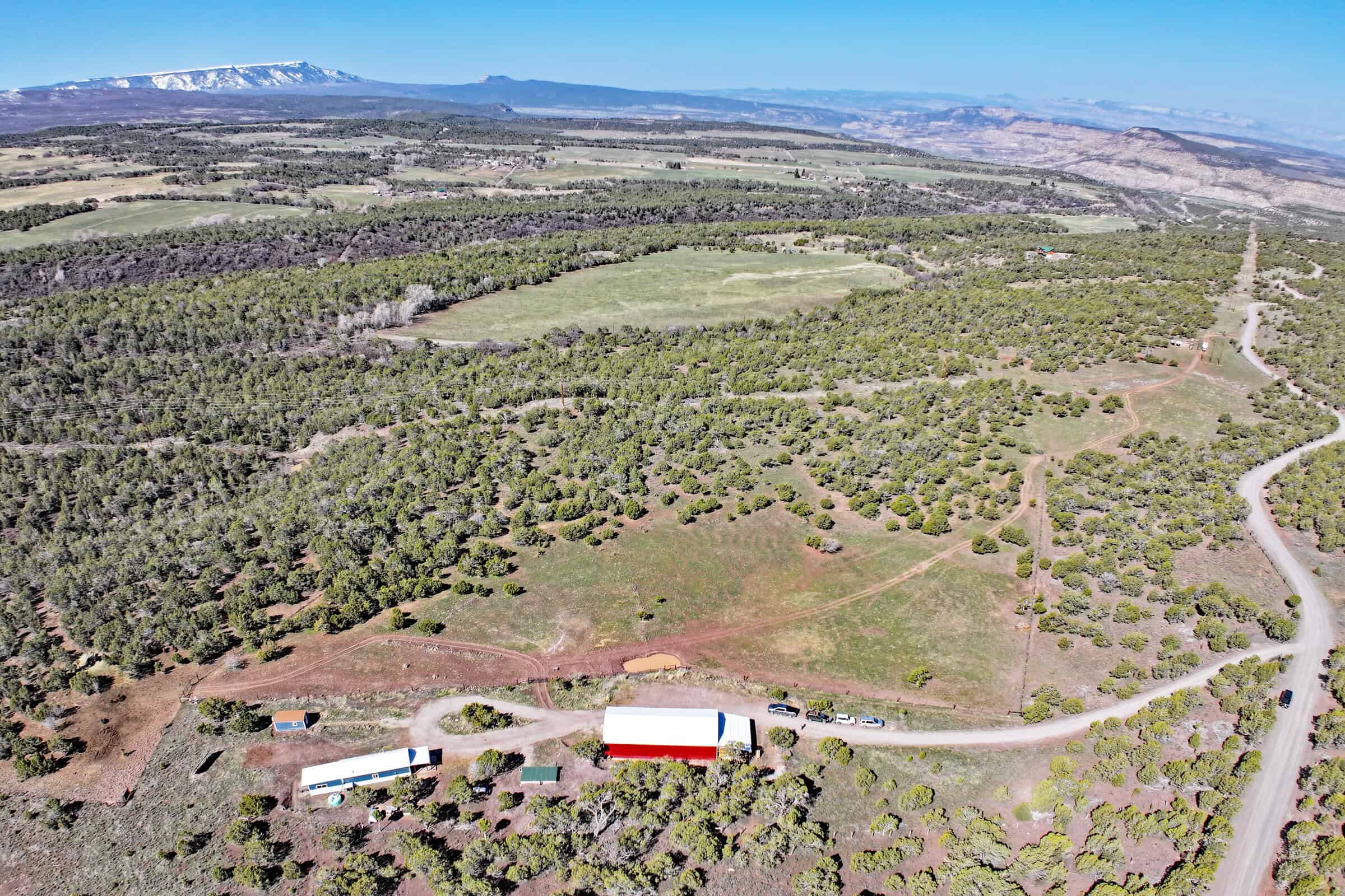 Home, Shop, Acreage with Ponds in 2 Parcels For Sale in Mesa County