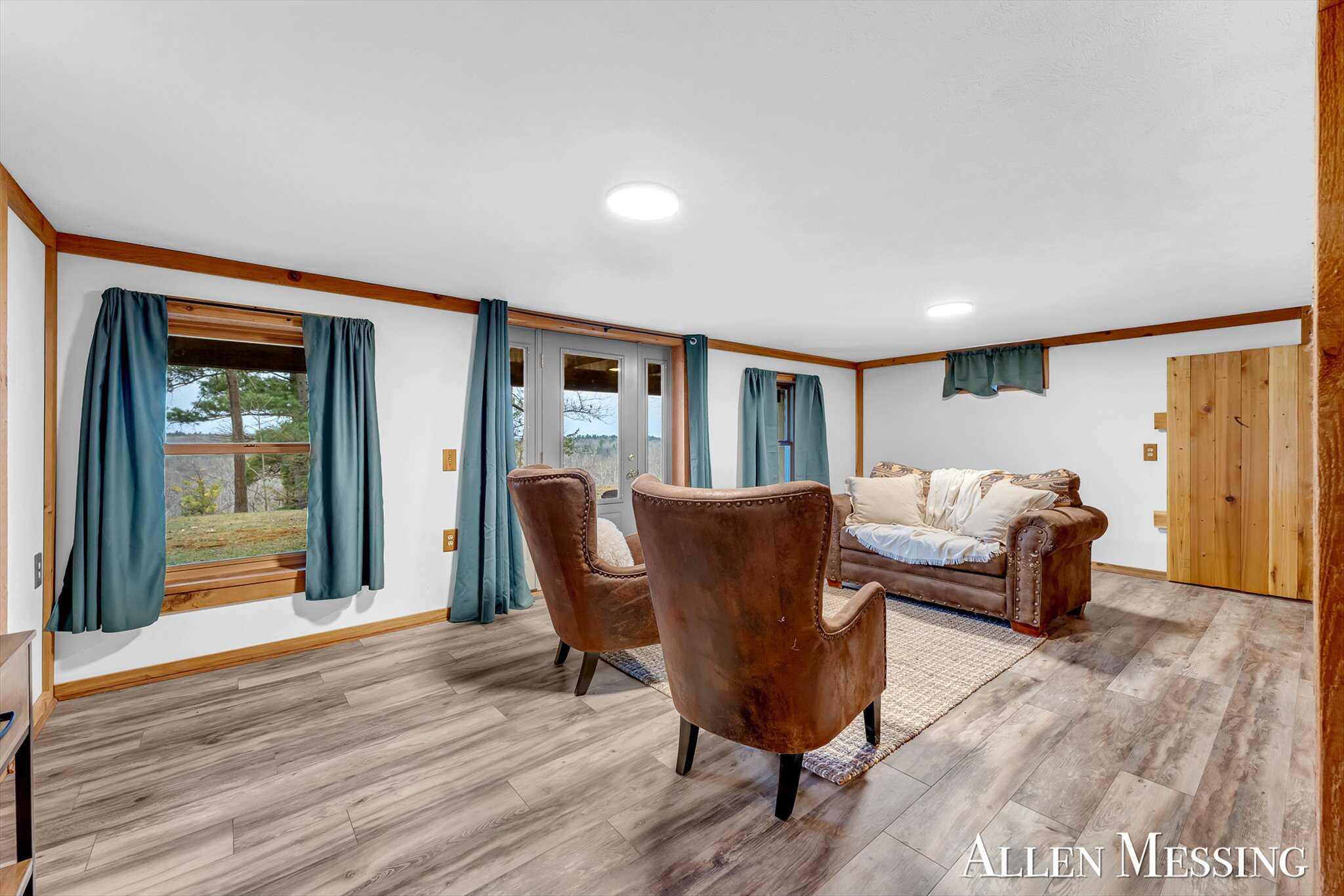 Custom Log Home on 10+ Acres with private Muskegon river frontage