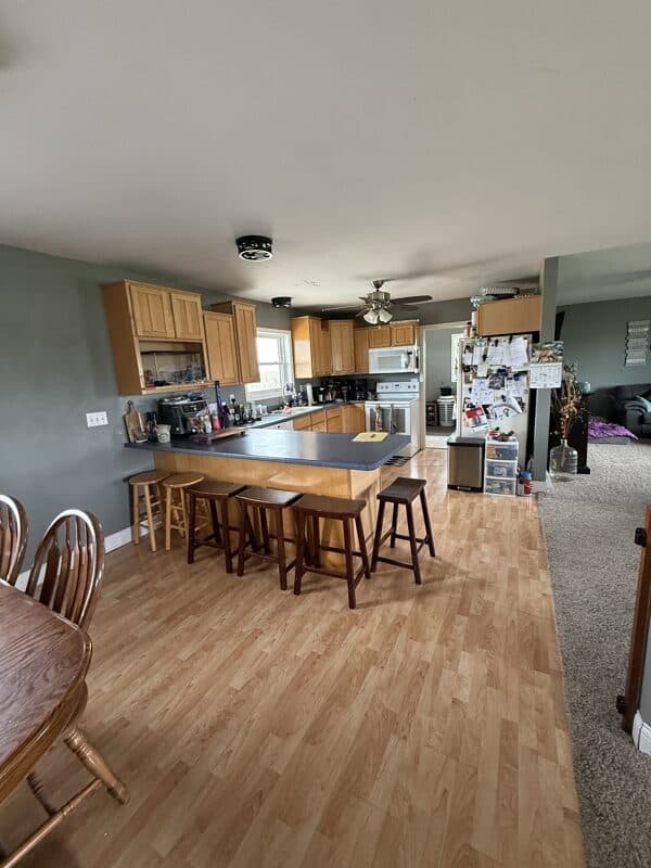 Rural Home on Highway with 7 ± Acres – 1 Mile from Mount Ayr