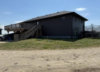 Rural Home on Highway with 7 ± Acres – 1 Mile from Mount Ayr