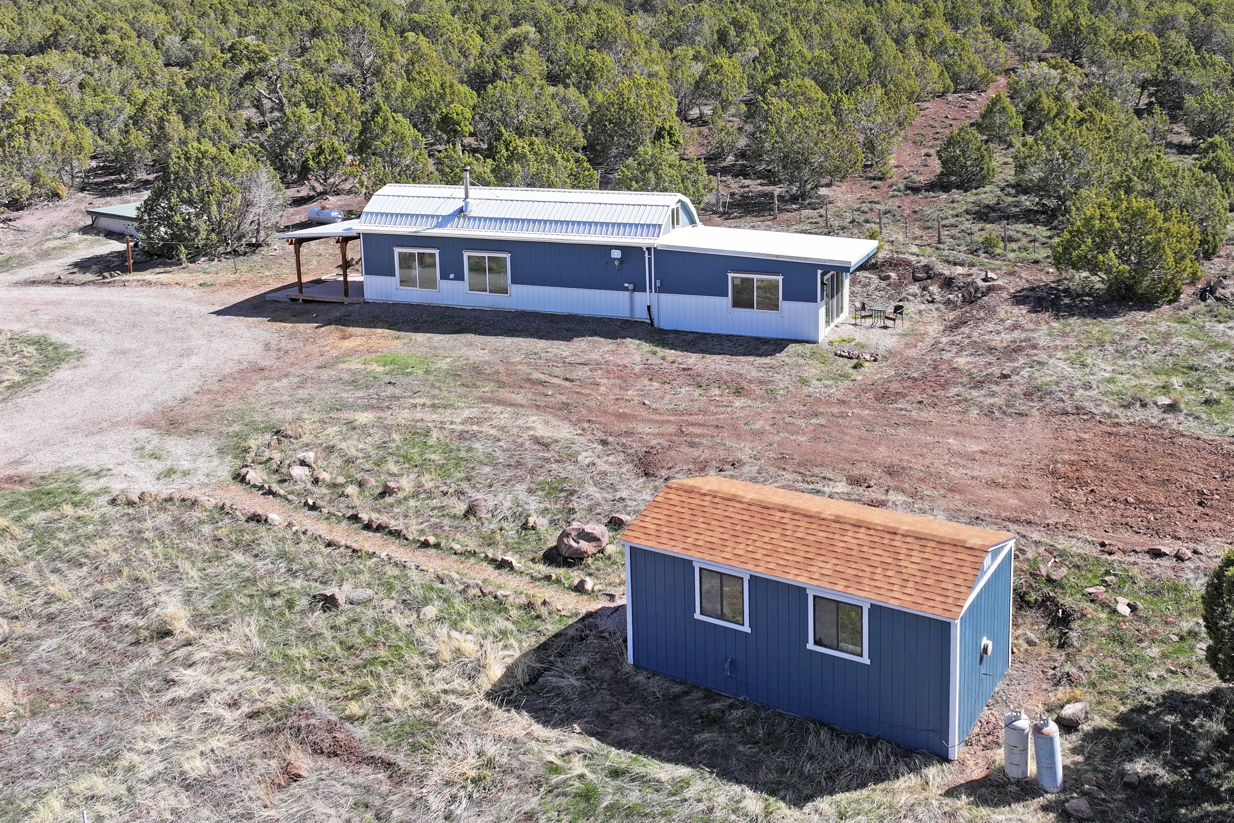 Home, Shop, Acreage with Ponds in 2 Parcels For Sale in Mesa County