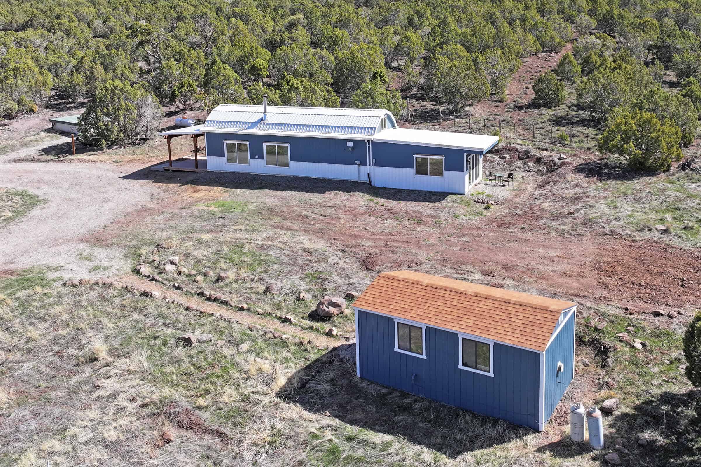 Home, Shop, Acreage with Ponds in 2 Parcels For Sale in Mesa County